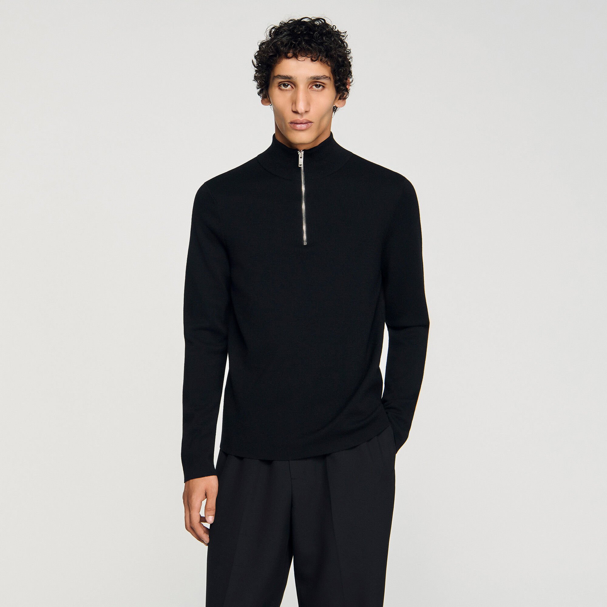 Wool sweater with zipped collar