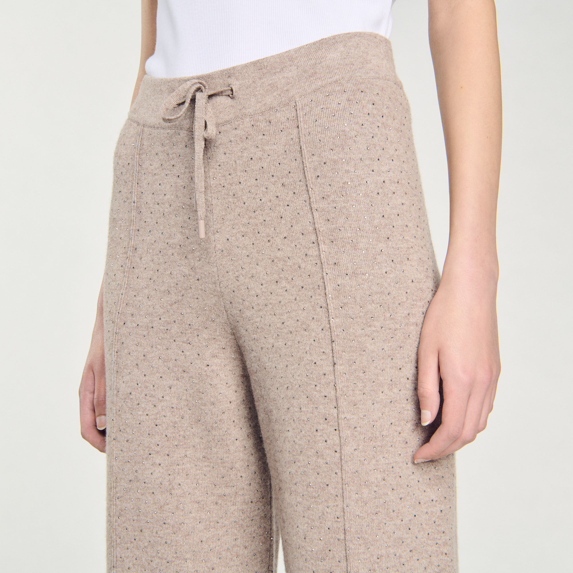 Knit rhinestone-covered trousers
