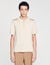 Knitted polo shirt with zip collar
