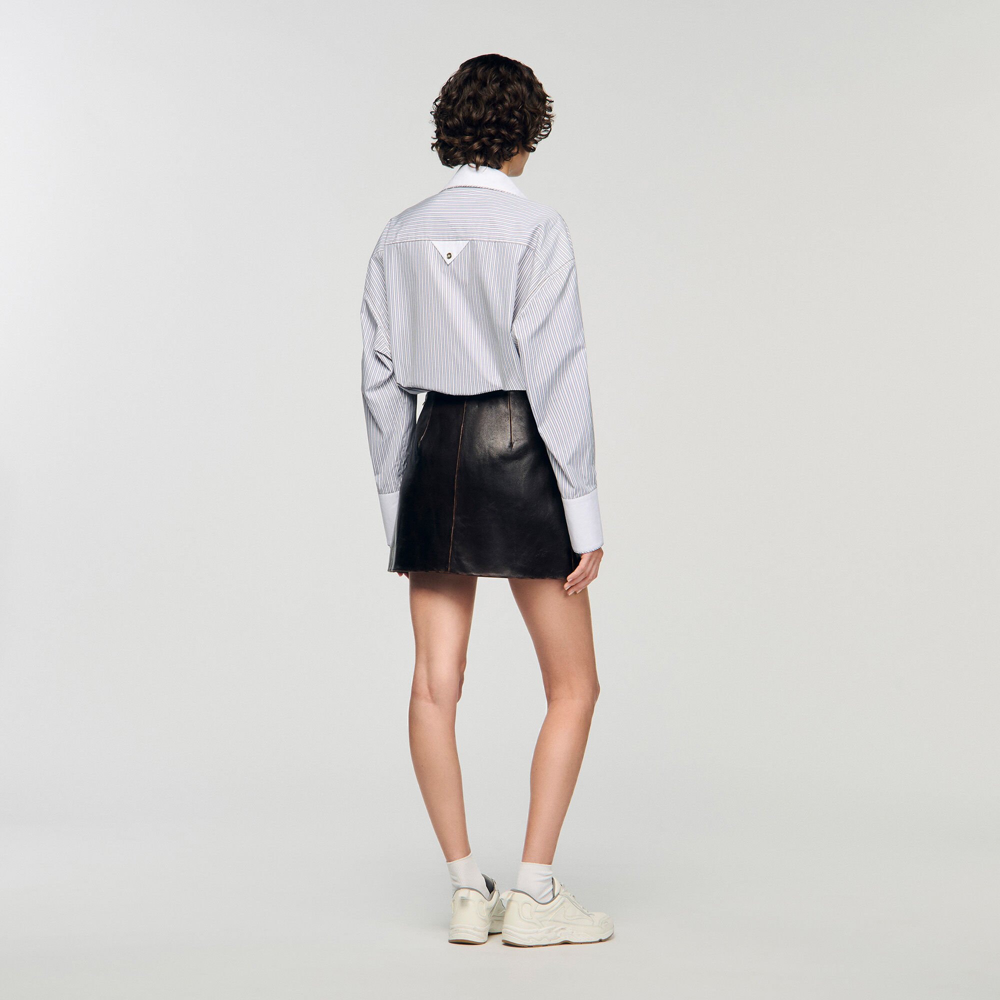 Mini aged leather skirt