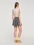 Buckle accent pleated skort