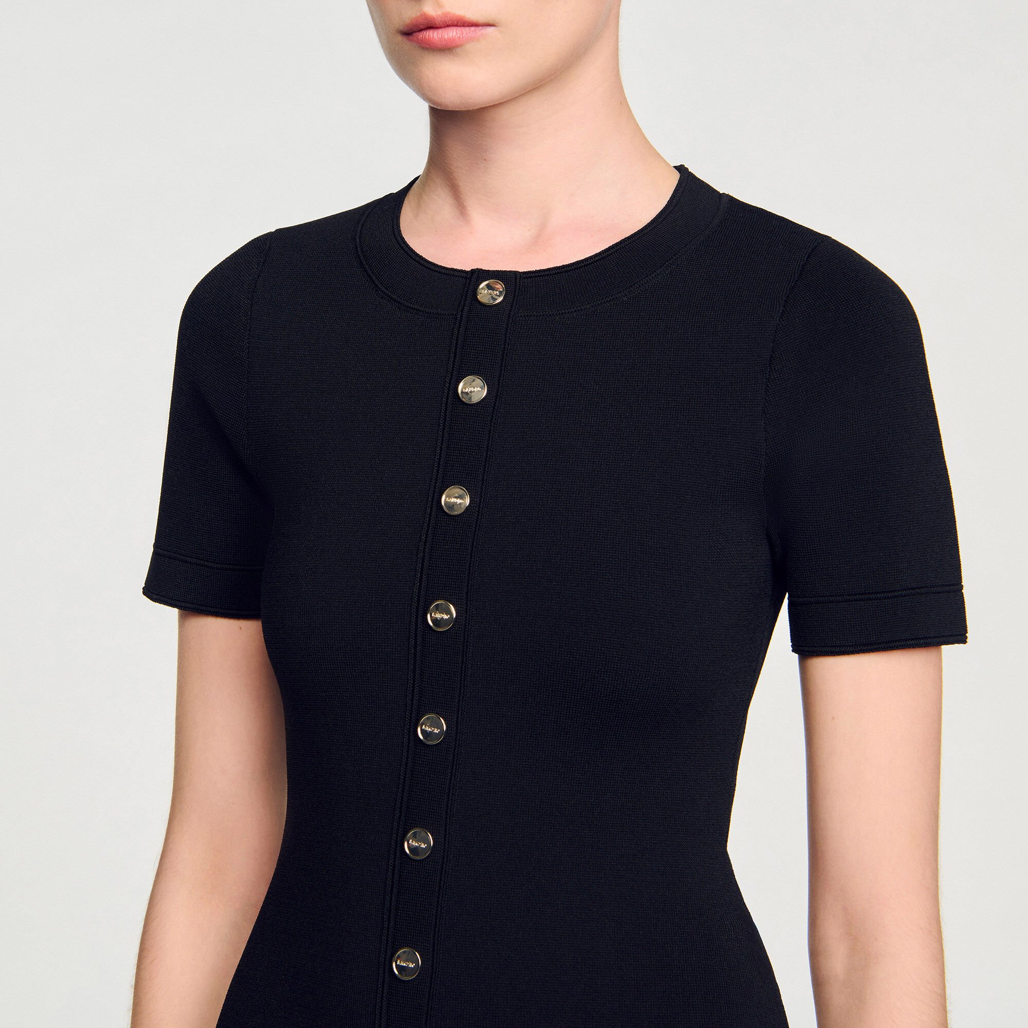 Mini knit dress with ruffle