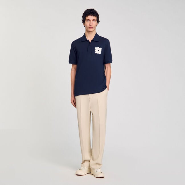 Polo shirt with flower patch