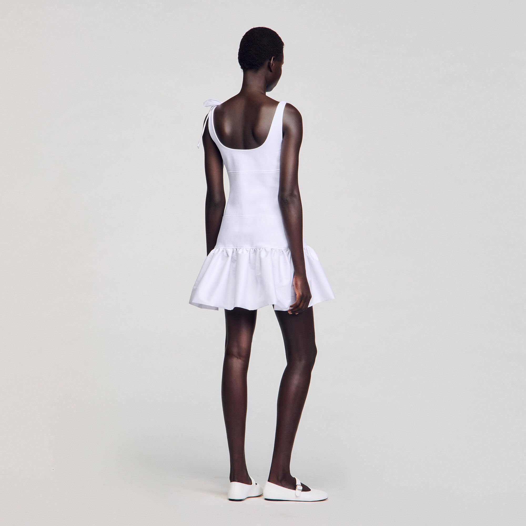 Dual-material mini dress