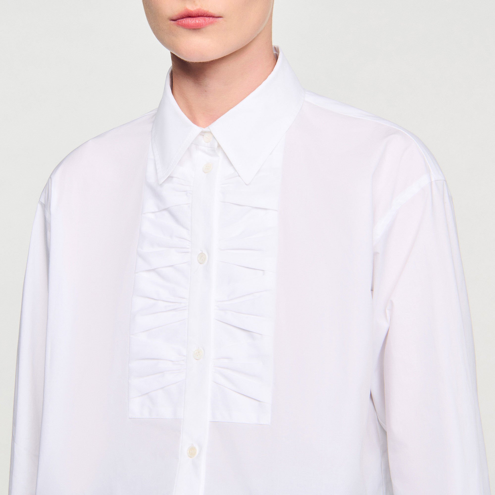 Cropped shirt with bow detail