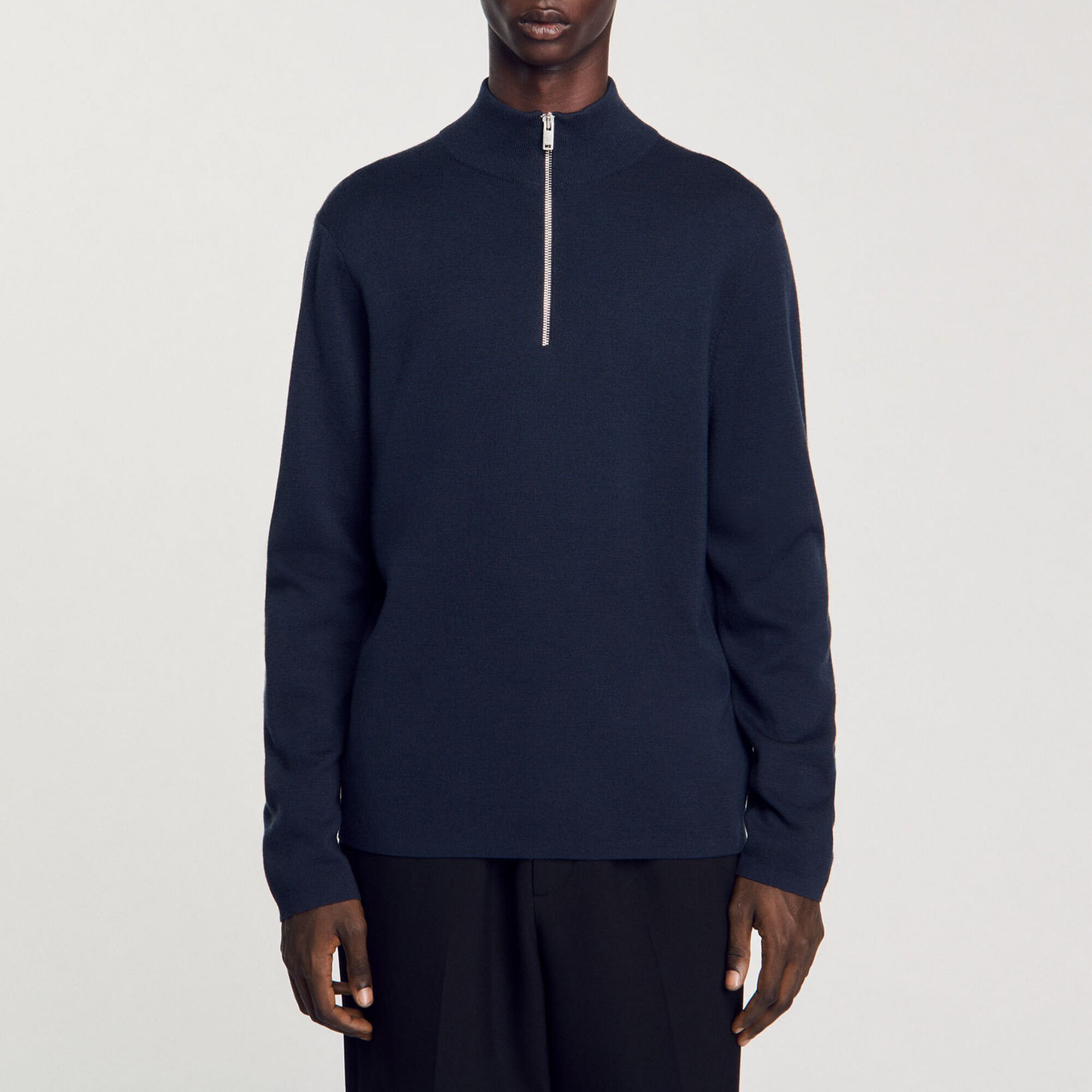 Wool sweater with zipped collar