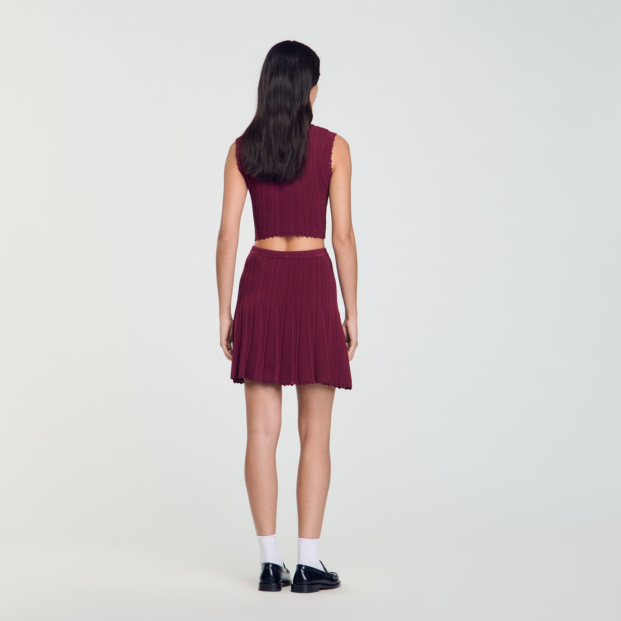 Short pleated knit skirt