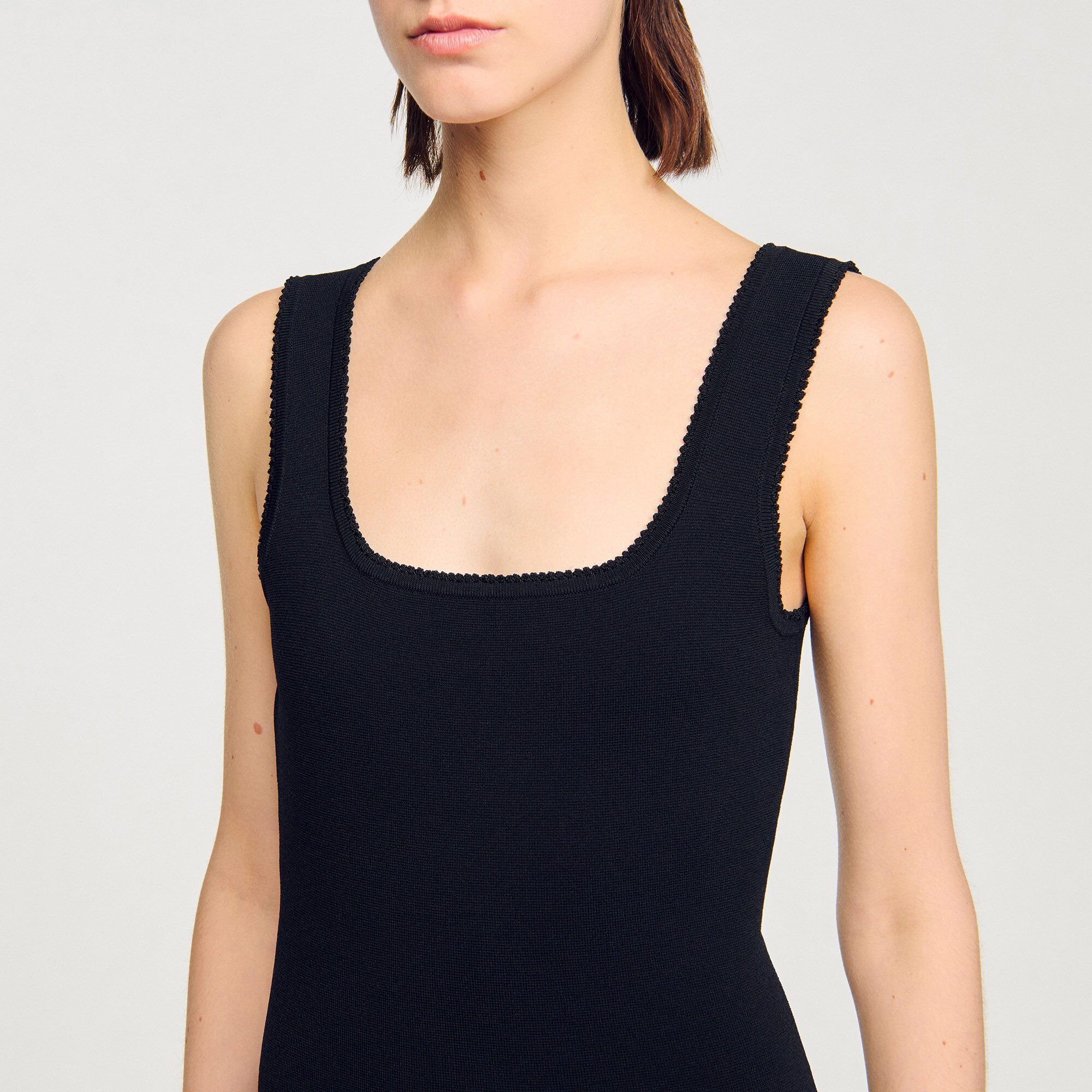 Mini knit dress with ruffles