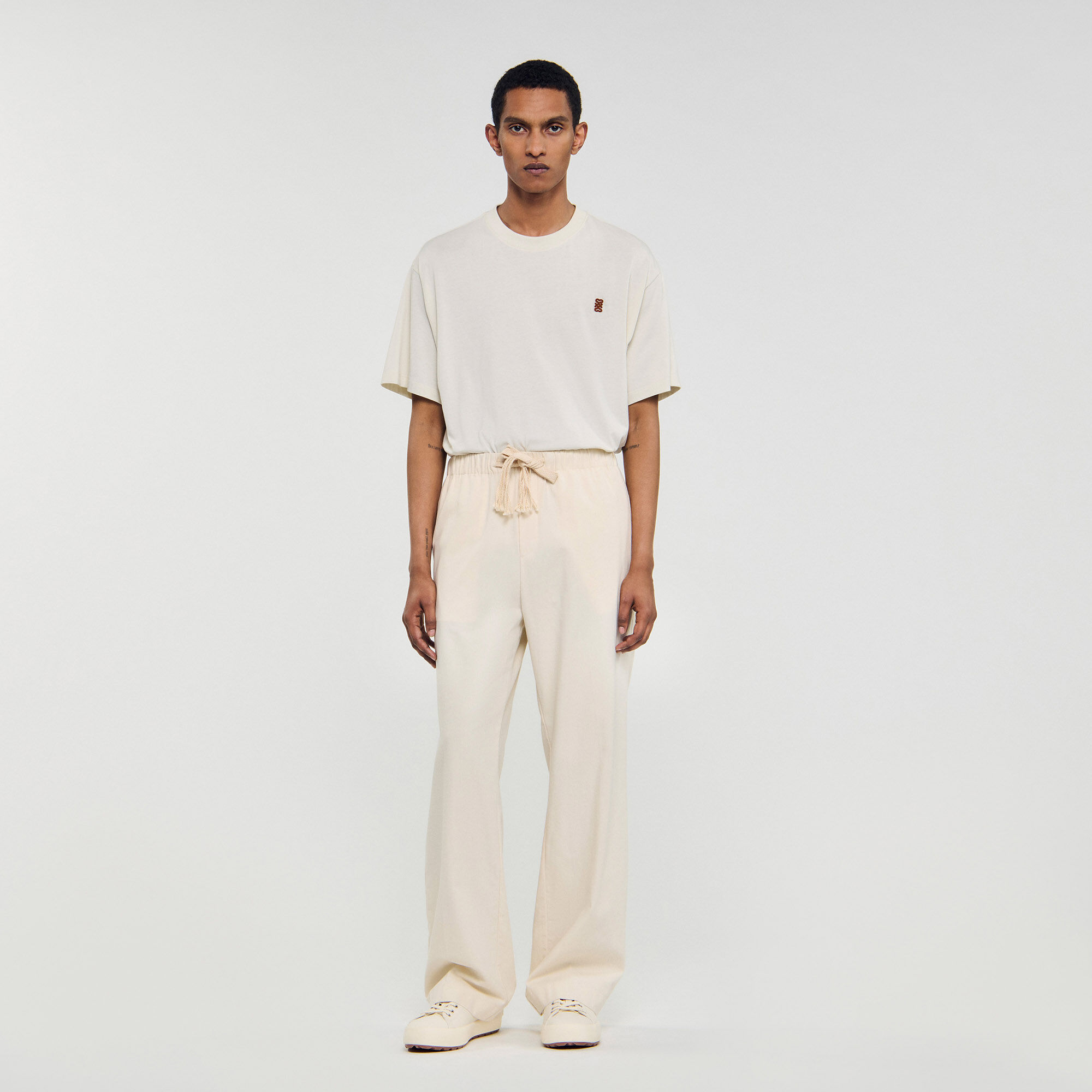 Wide-leg elasticated cotton trousers white / beige for Men