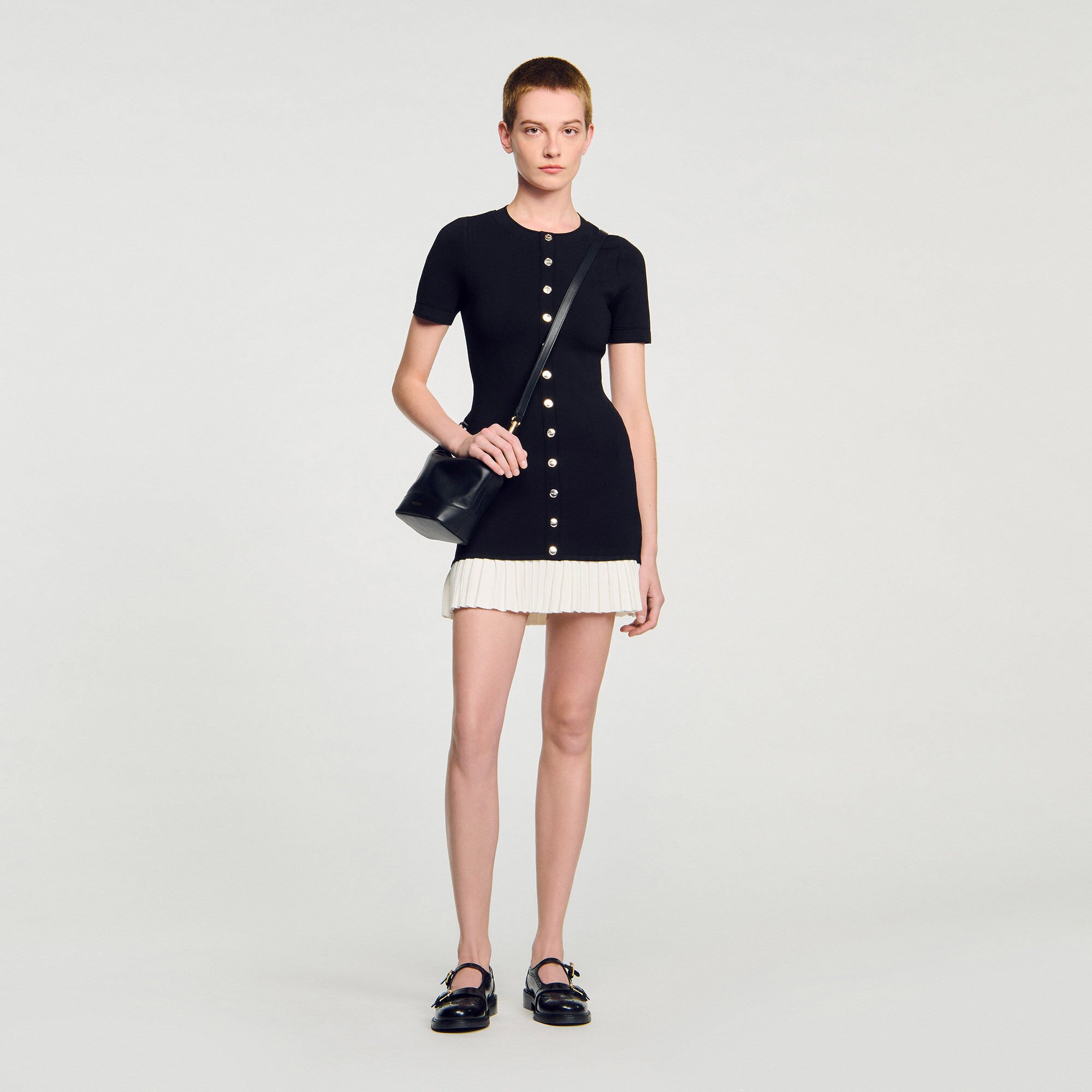 Mini knit dress with ruffle