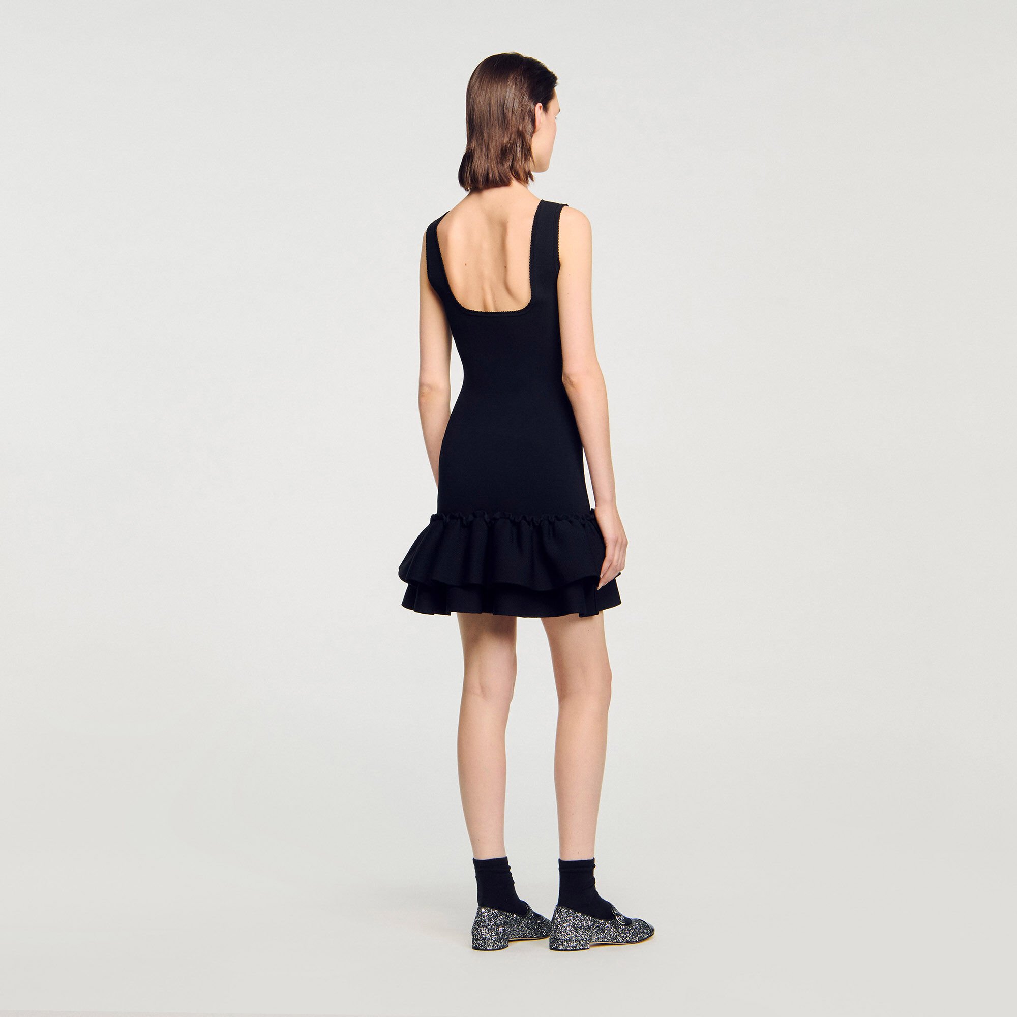 Mini knit dress with ruffles