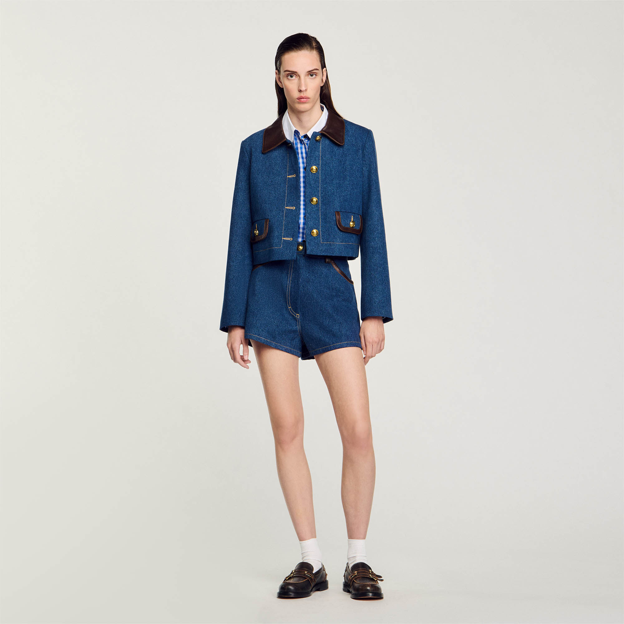 Denim jacket with leather collar