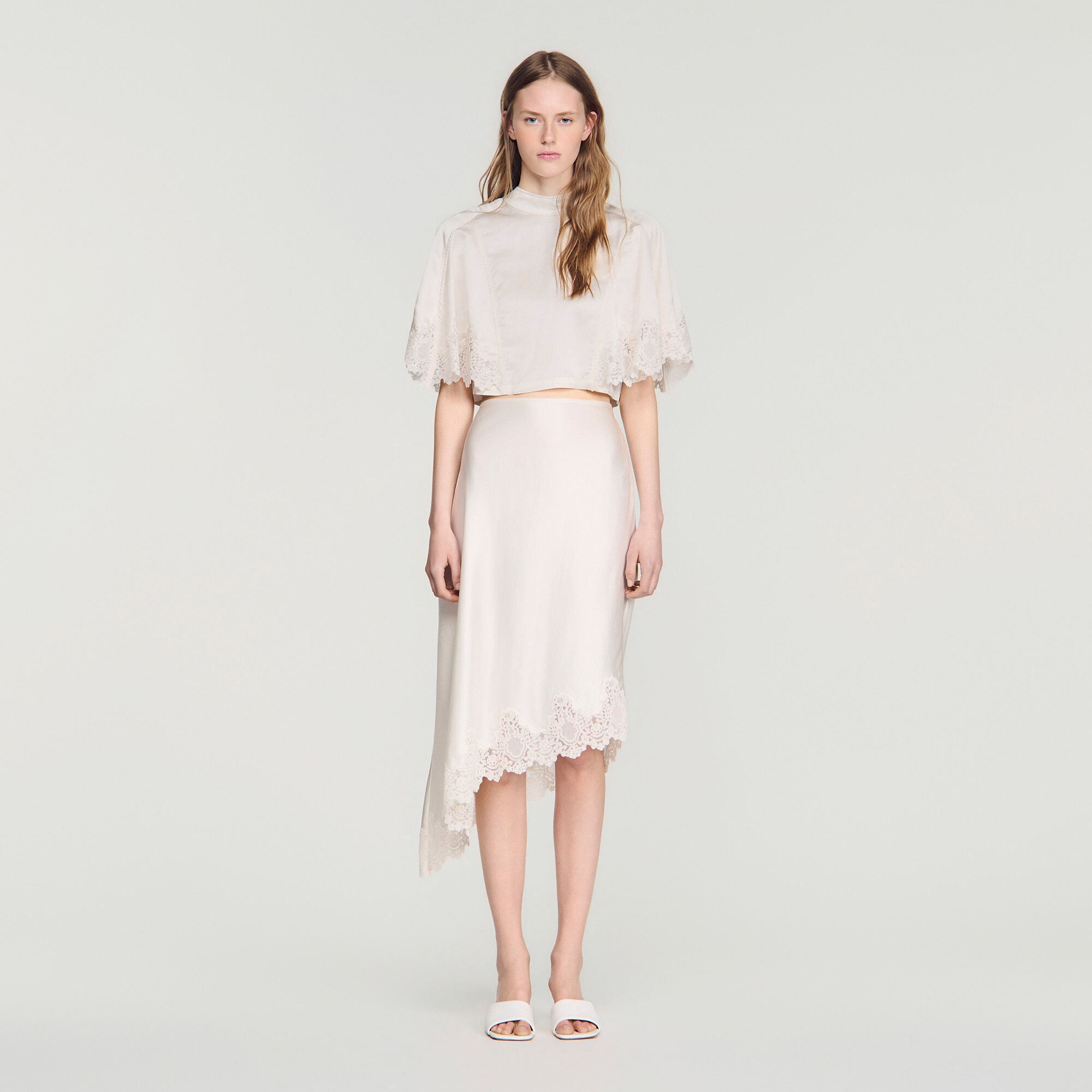 Asymmetrical satin skirt with lace