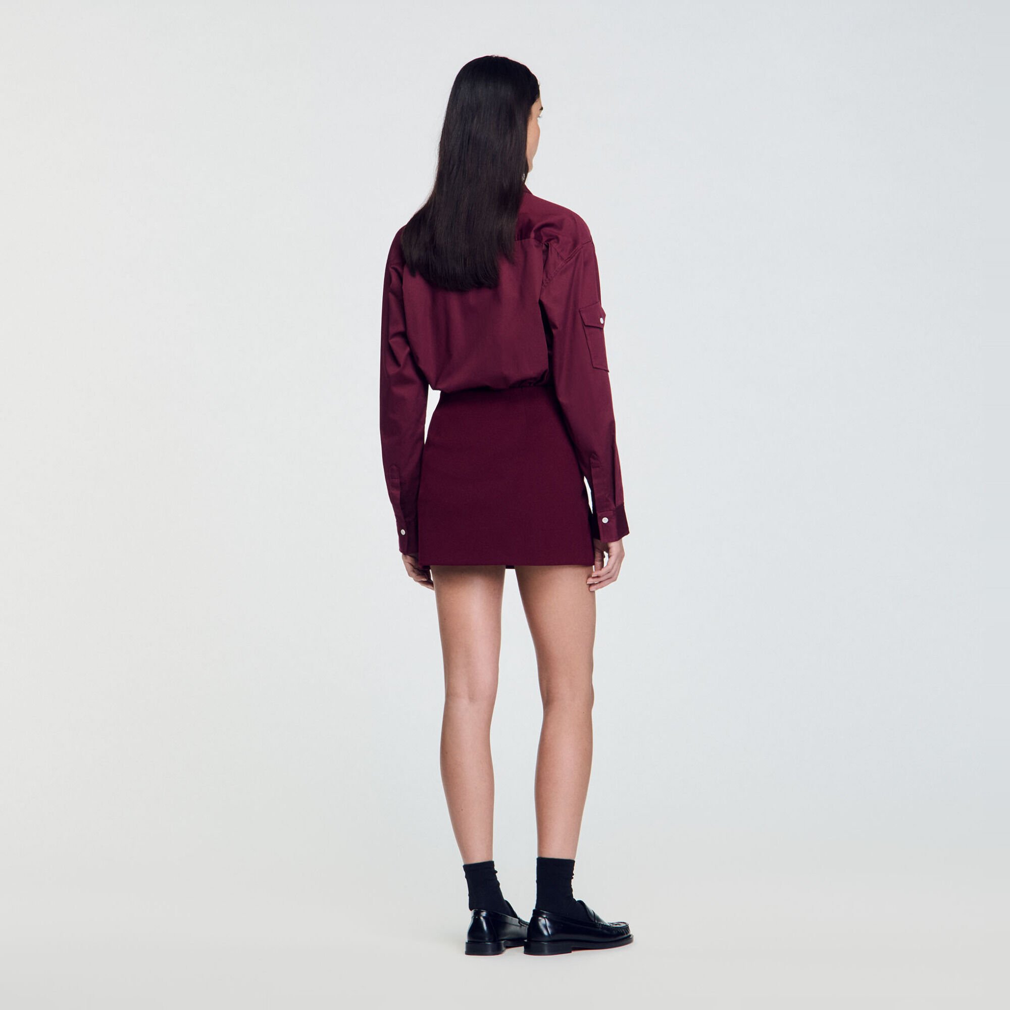 Short skirt with press studs