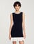 Mini knit dress with beaded neck
