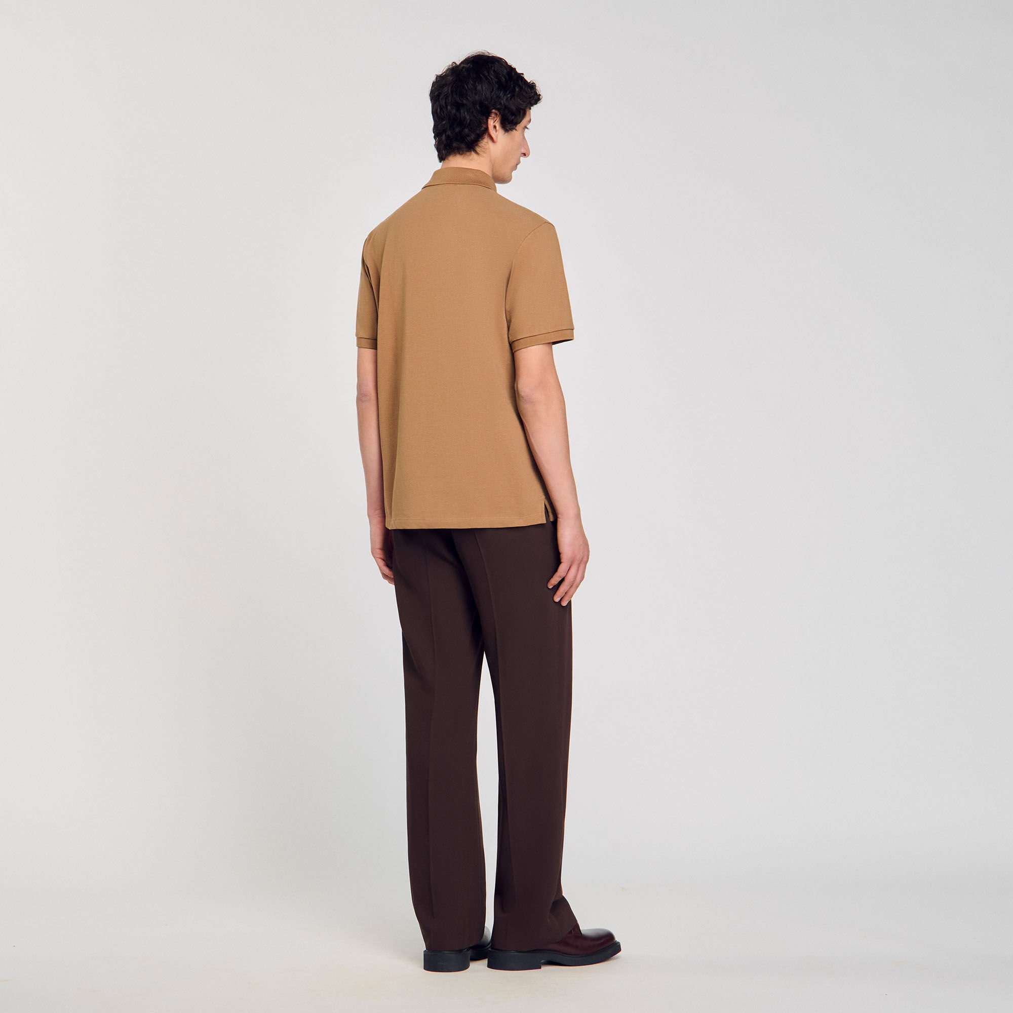 Polo shirt with flower patch