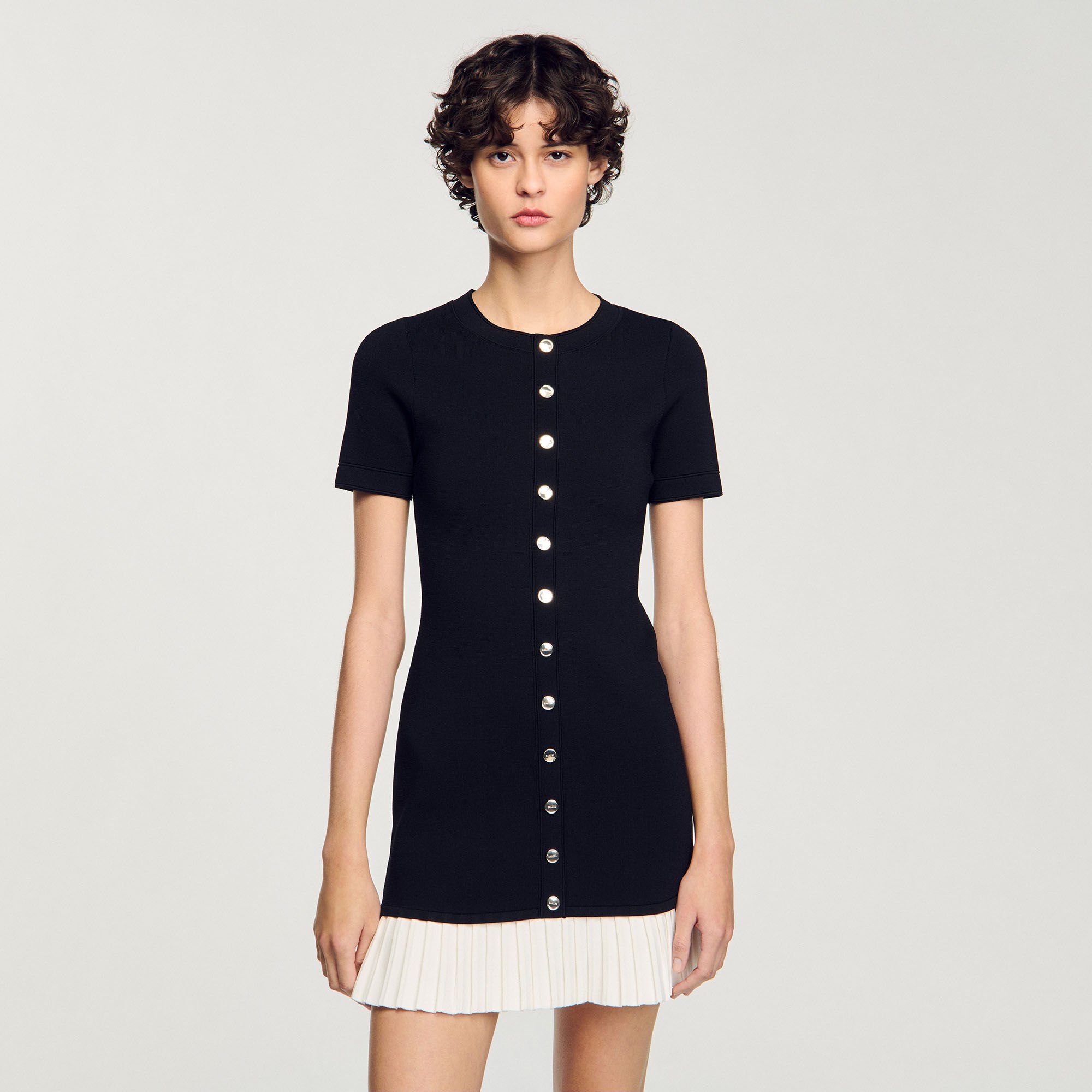 Mini knit dress with ruffle