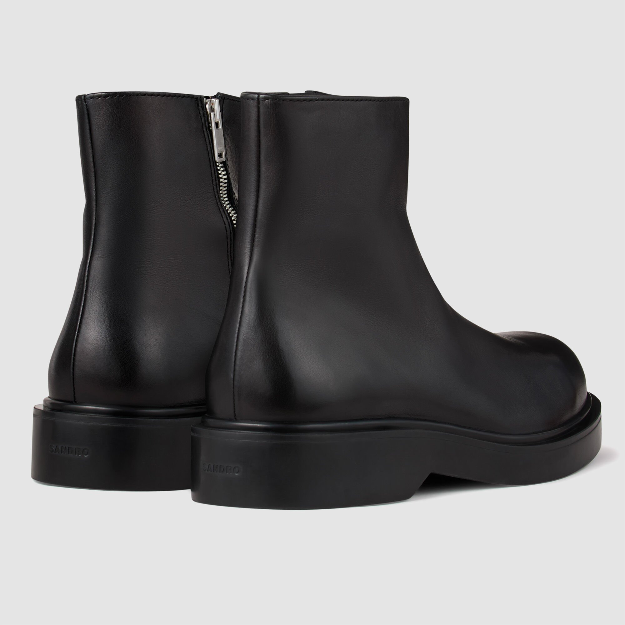Zipped leather ankle boots