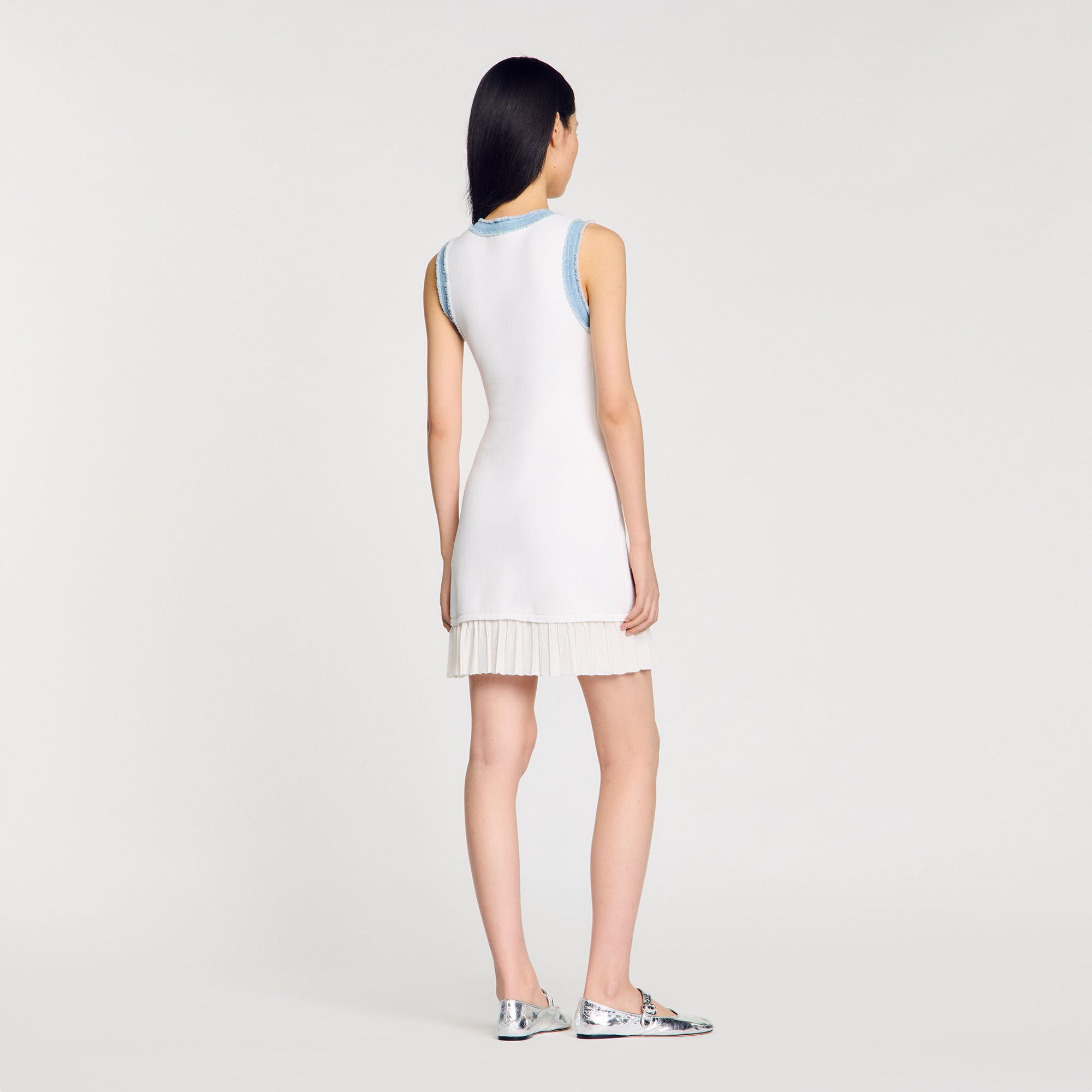 Mini knit dress with ruffles