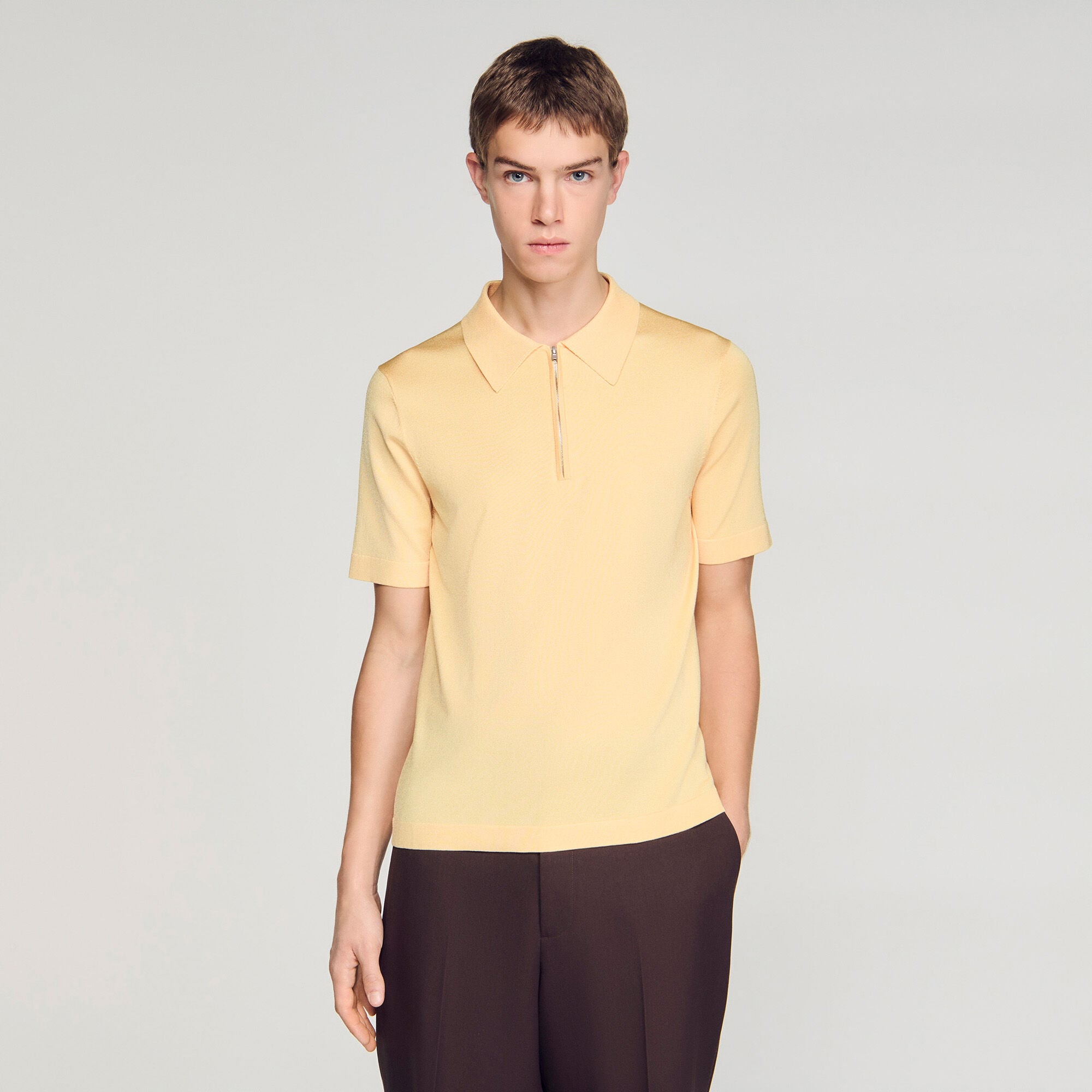 Knitted polo shirt with zip collar in Black for Men | Sandro Paris