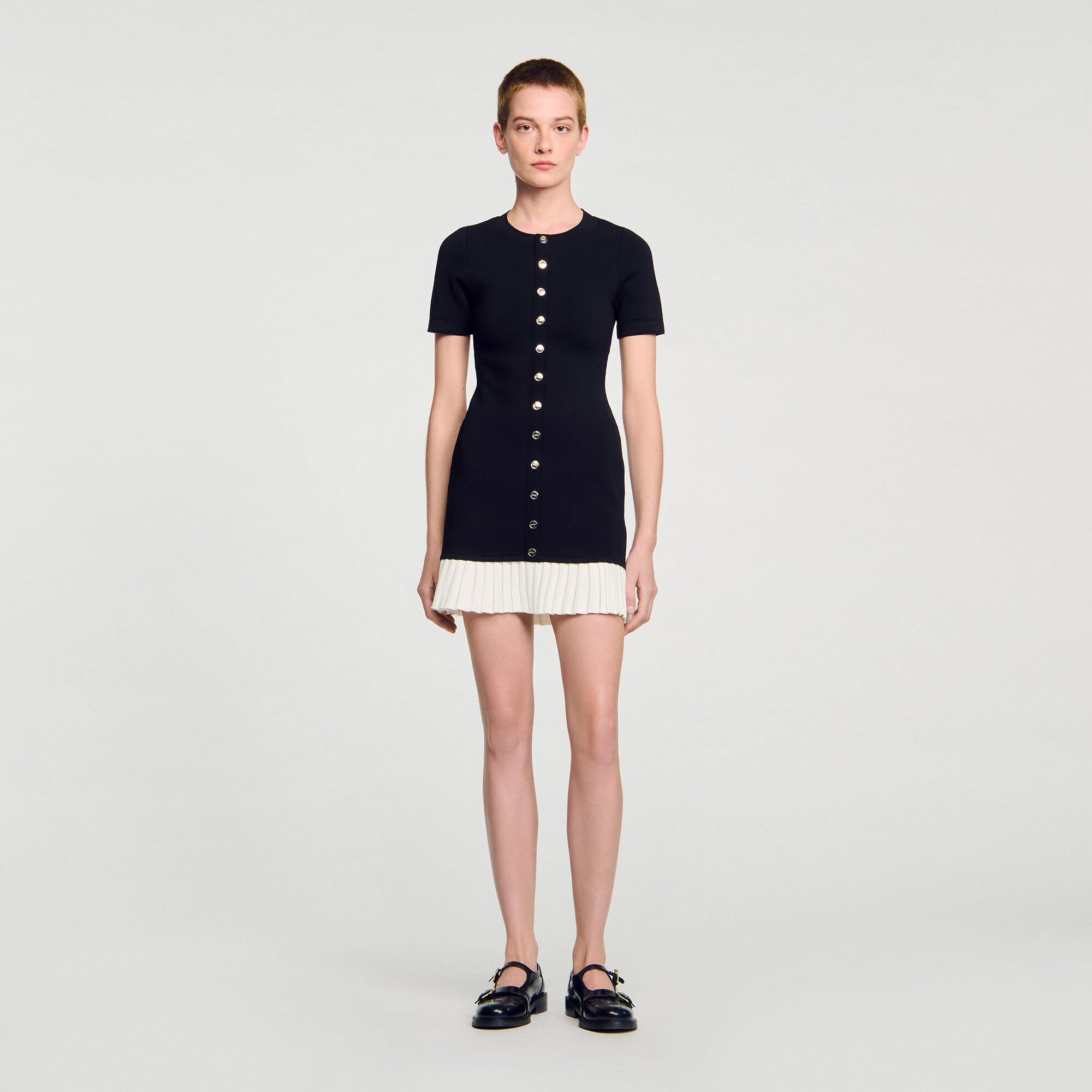 Mini knit dress with ruffle