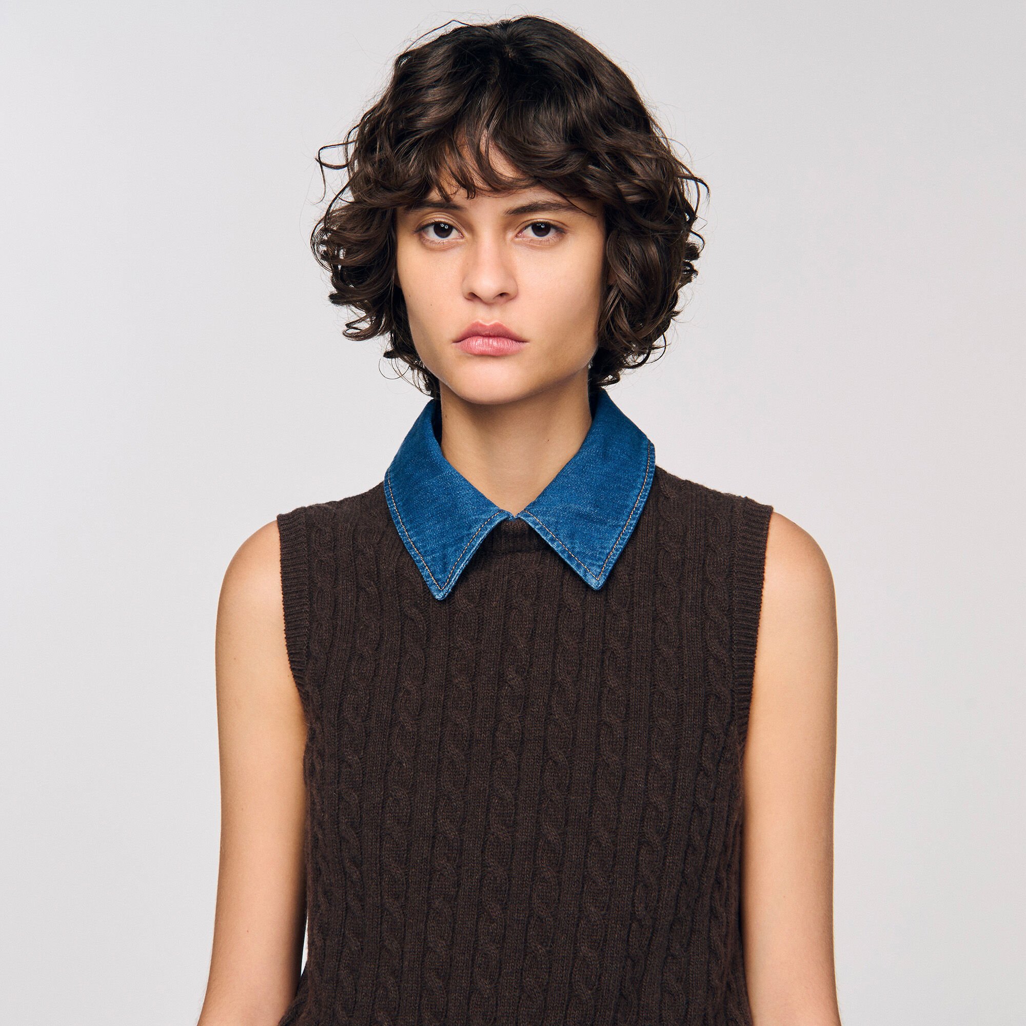 Knit and denim sweater