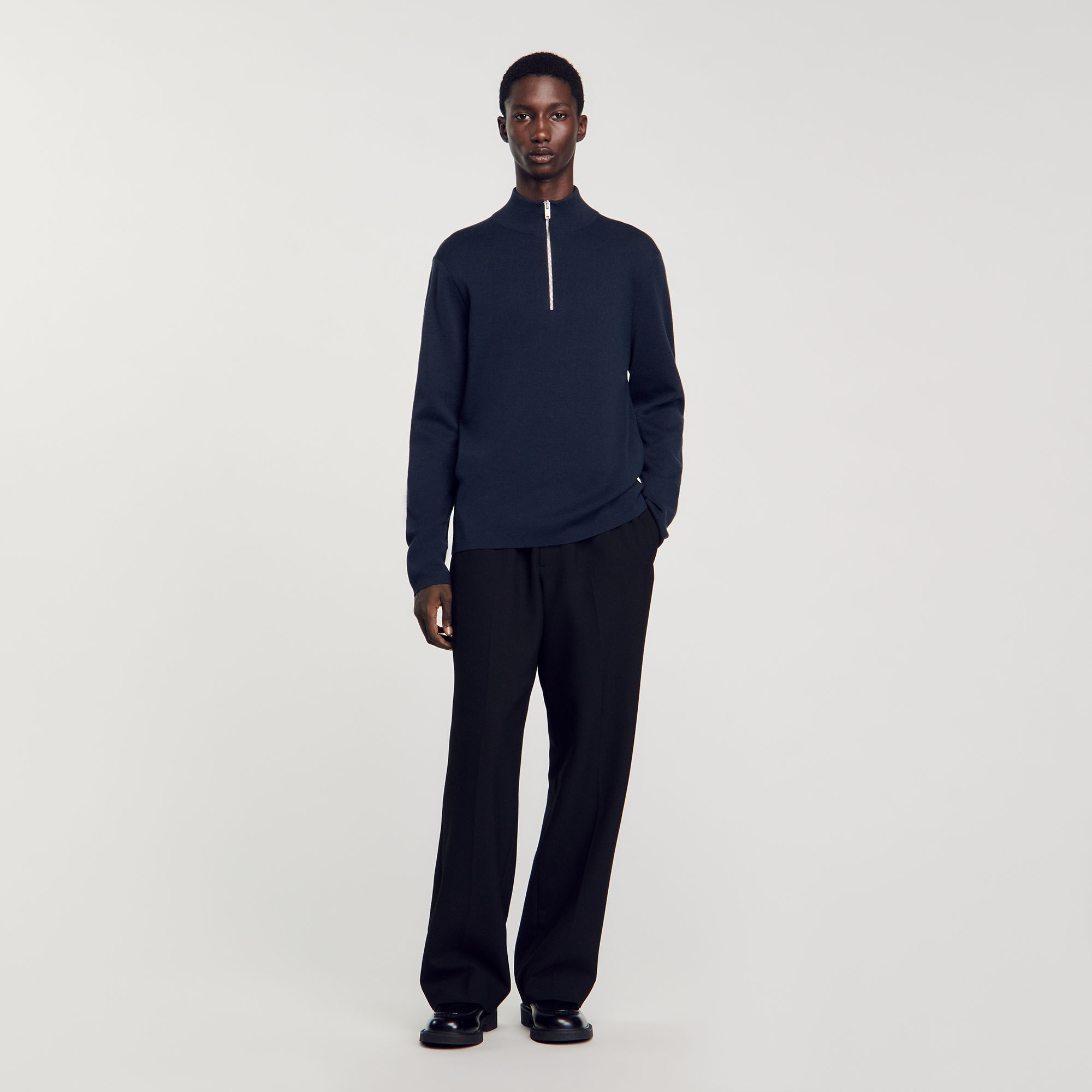 Wool sweater with zipped collar