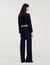 High-waisted tweed trousers