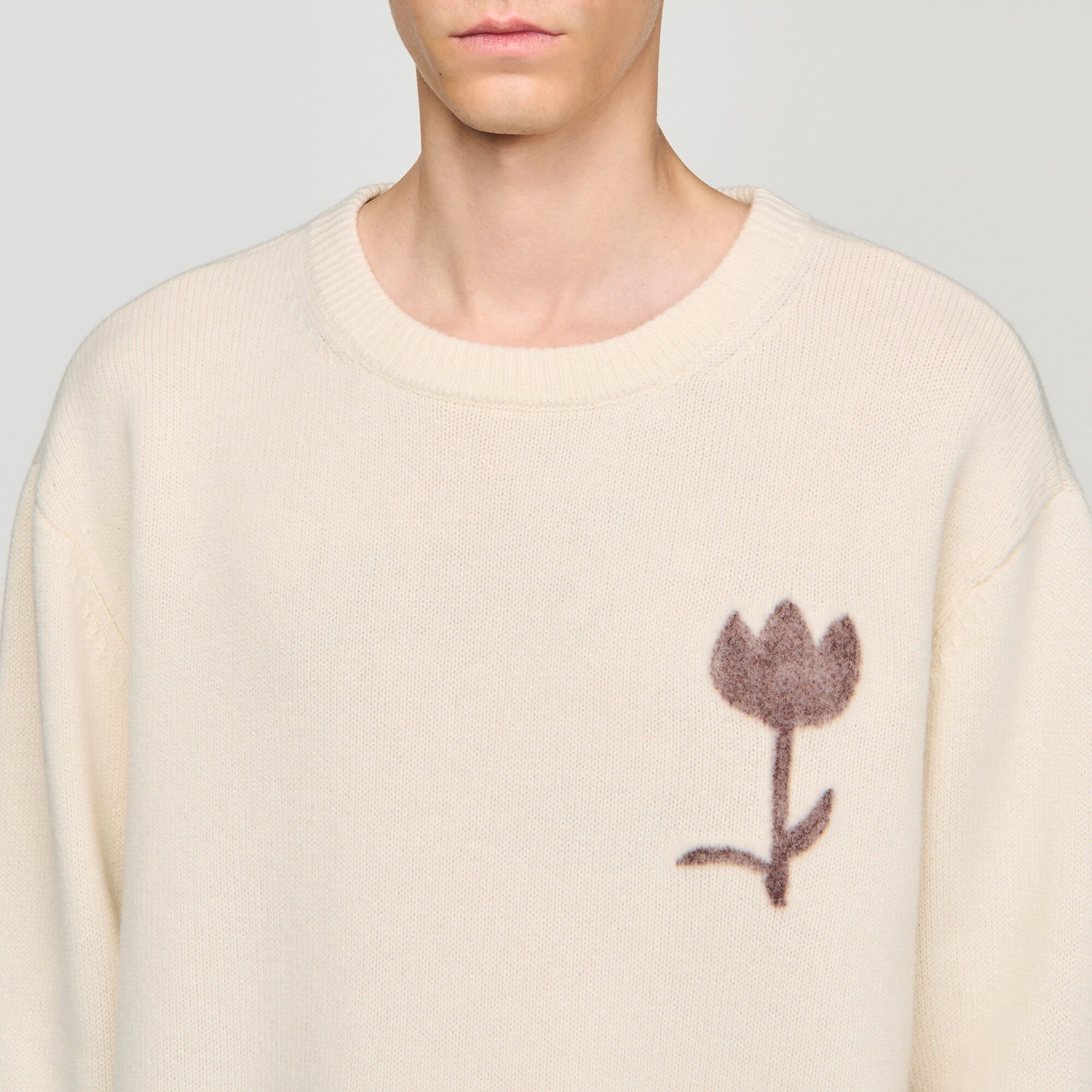 Wool sweater with flower detail