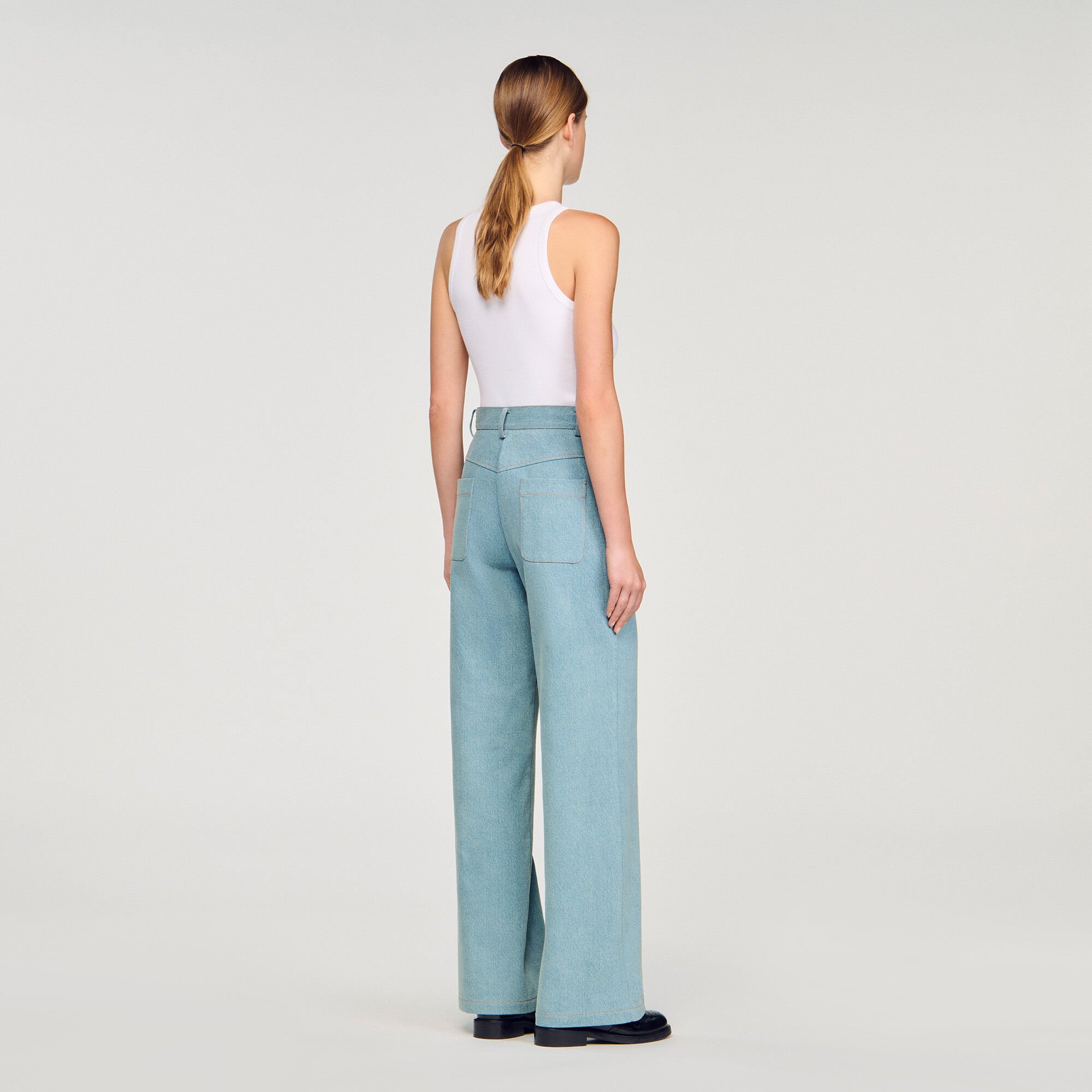 Faded high-rise wide-leg jeans