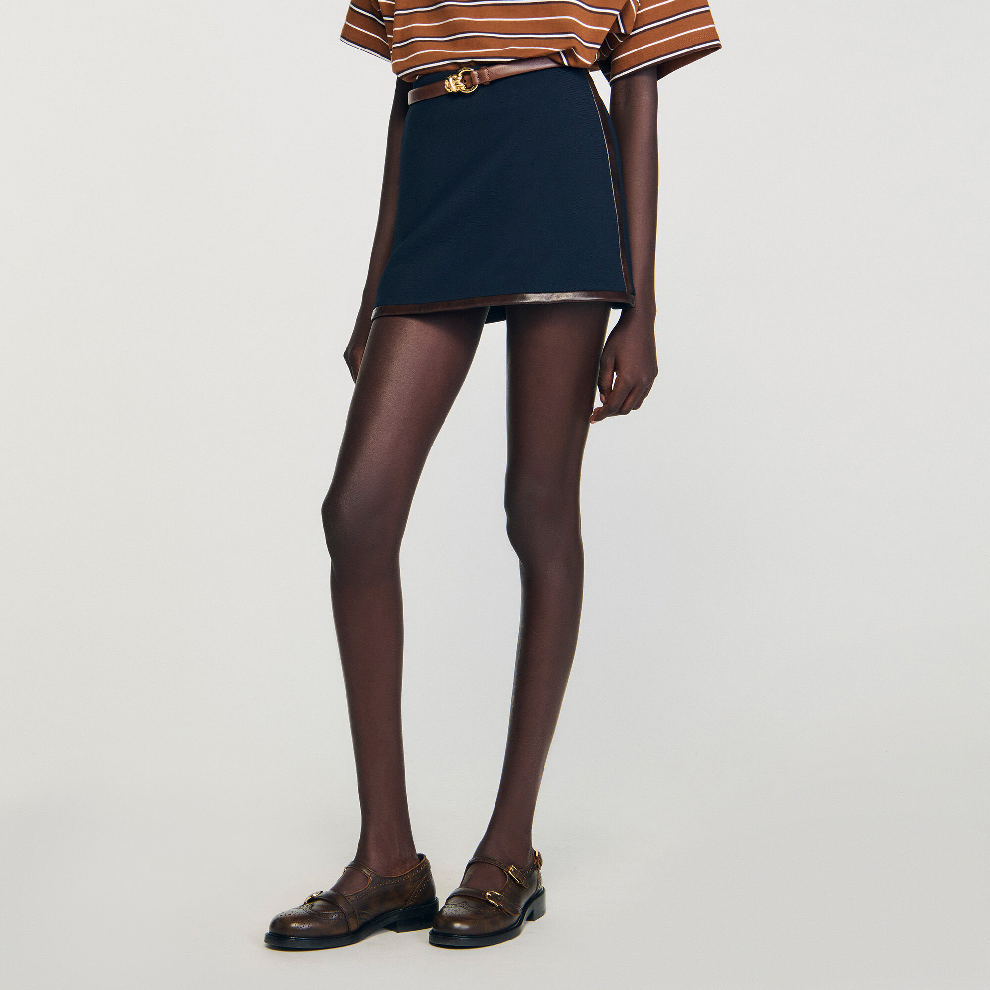 Mini skirt with leather bands