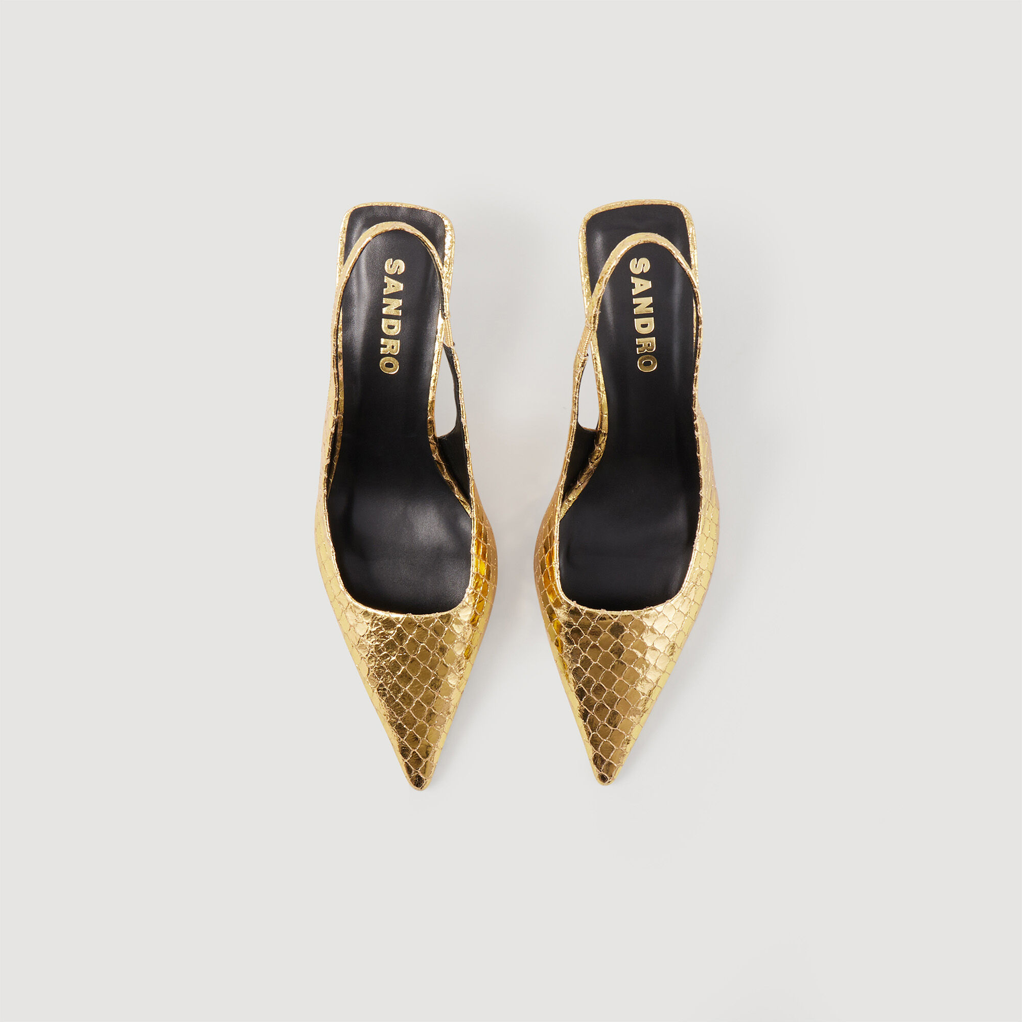 Gold slingback pumps top