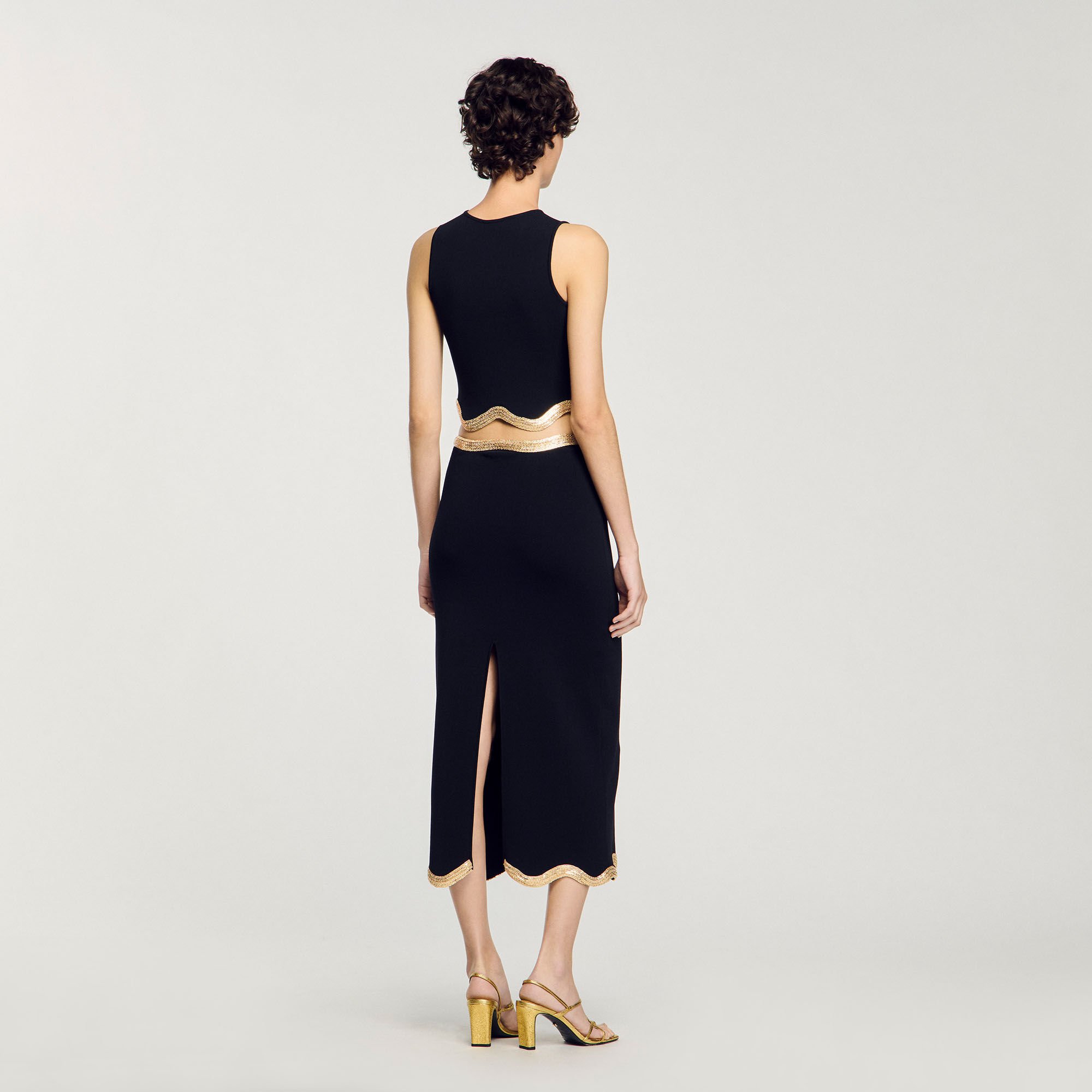 Long knitted skirt with chain detail