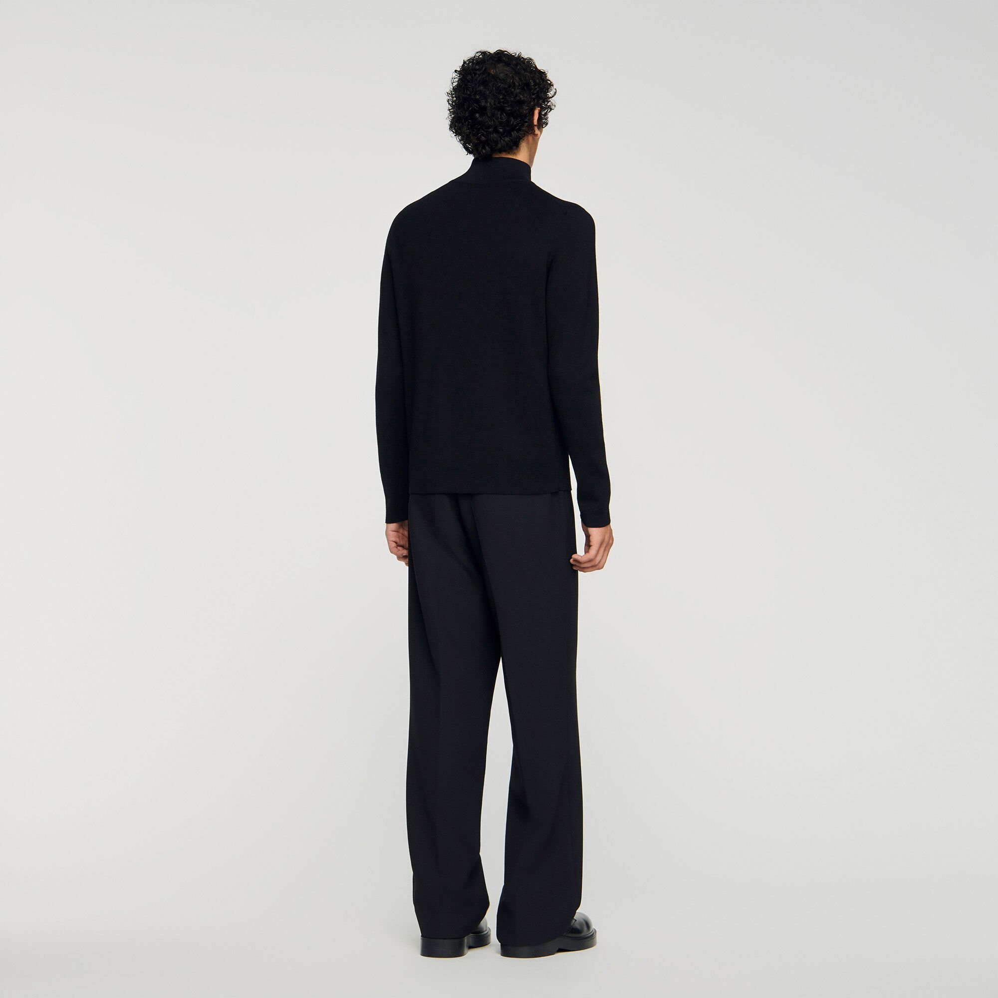 Wool sweater with zipped collar
