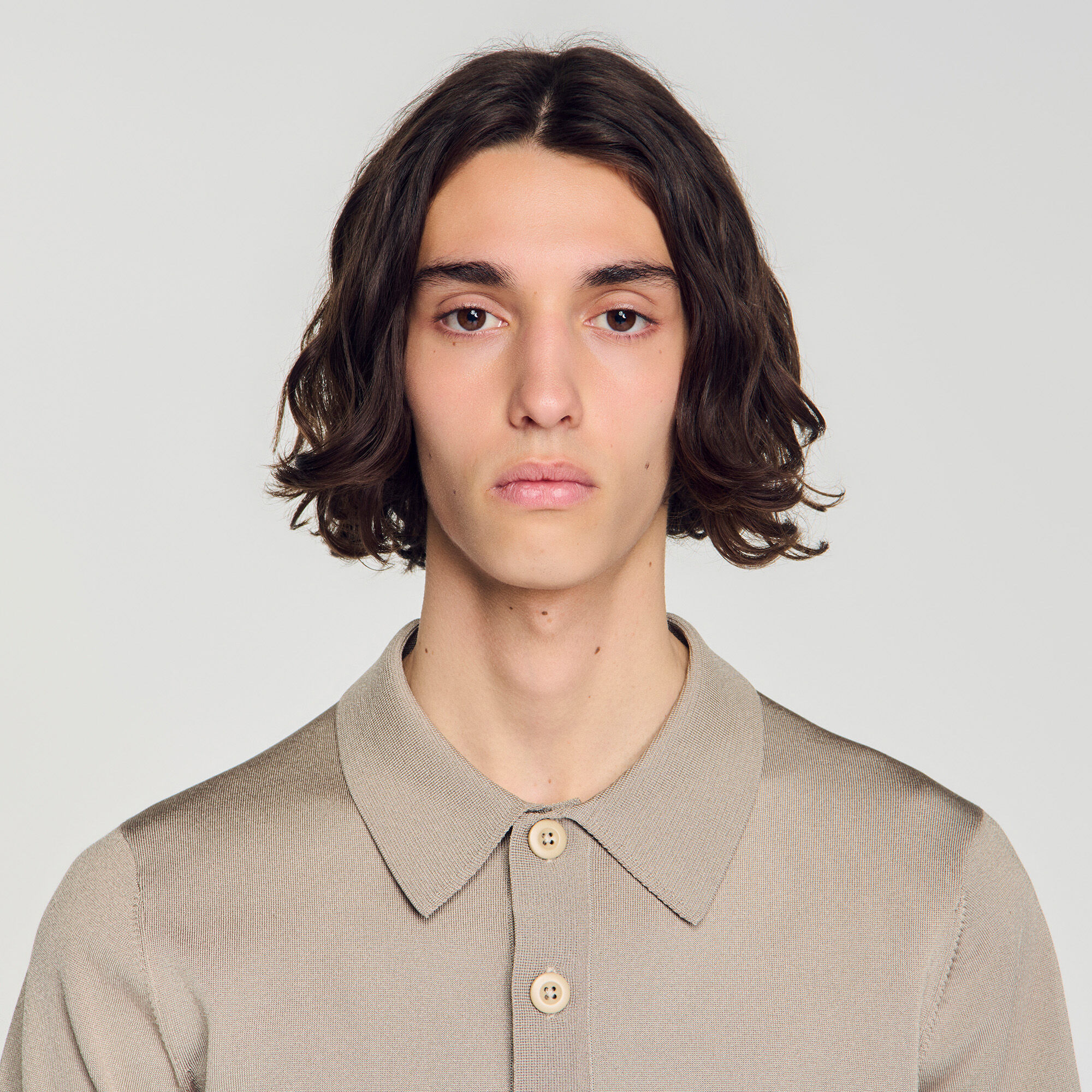Short-sleeve knitted polo shirt in white for Men | Sandro Paris