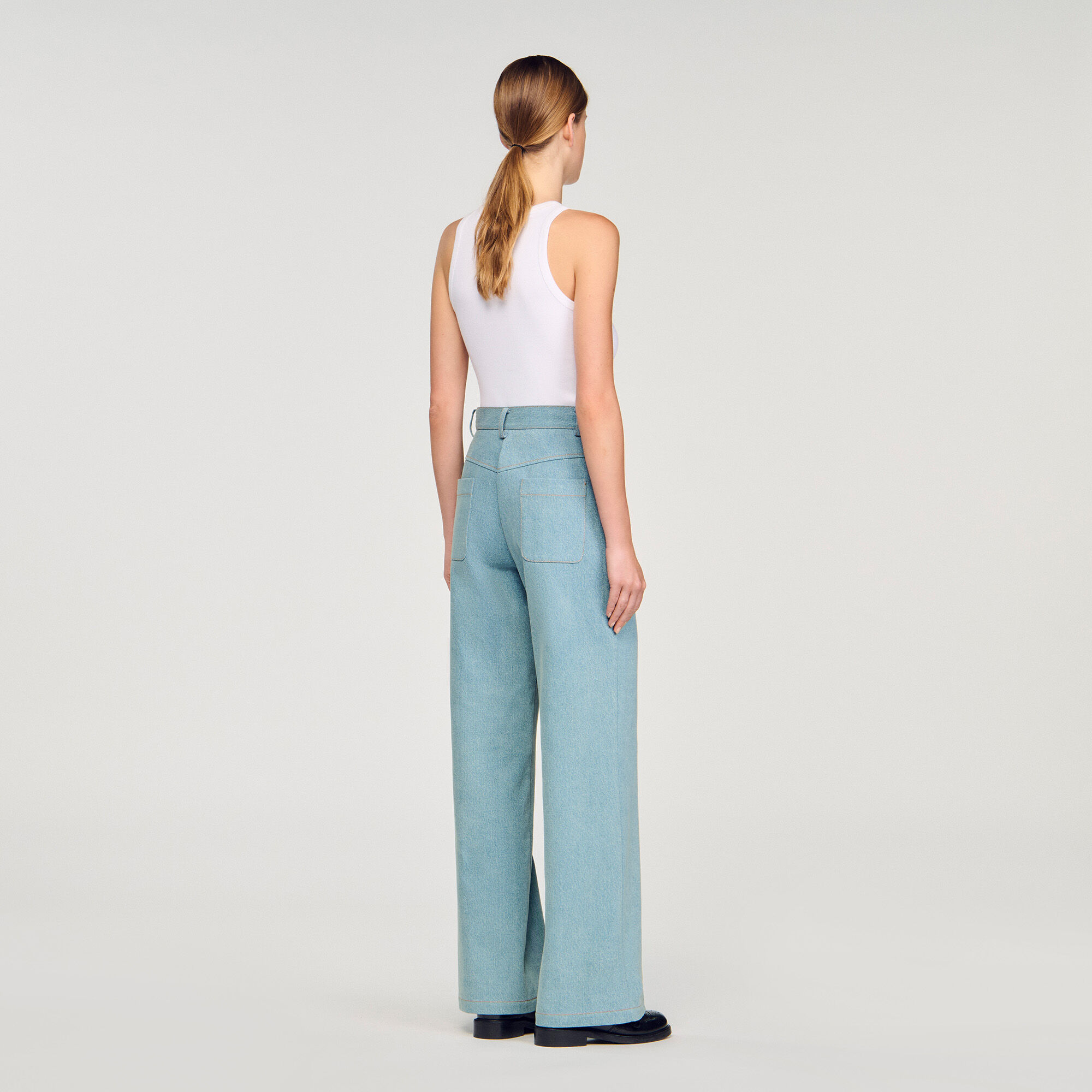 Faded high-rise wide-leg jeans