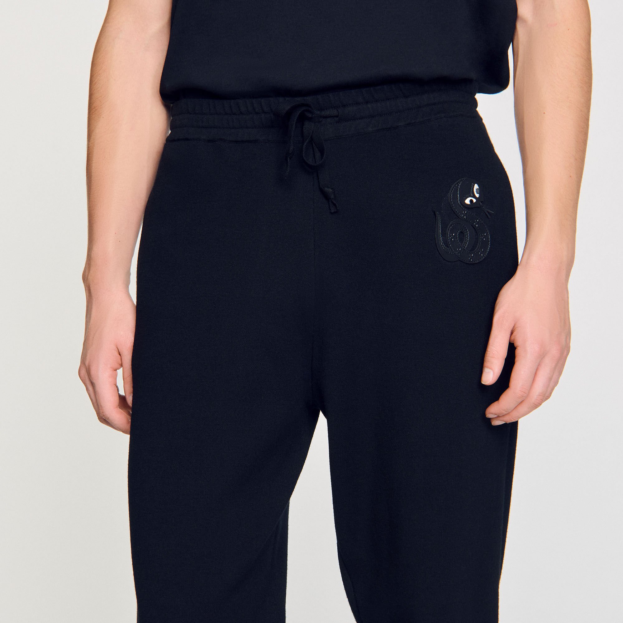 Joggers with snake detail