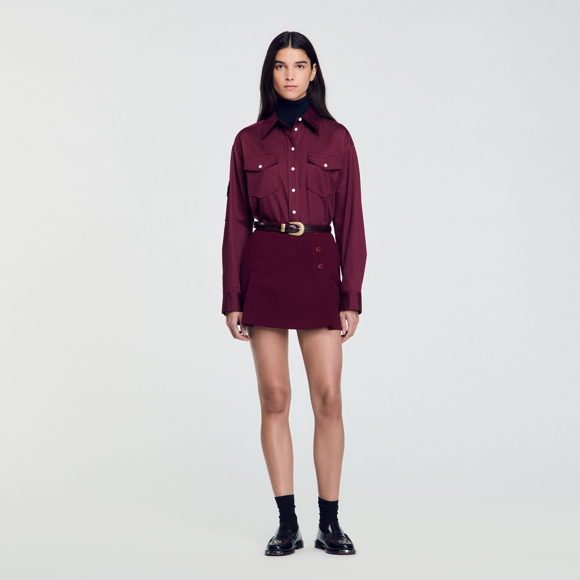 Short skirt with press studs