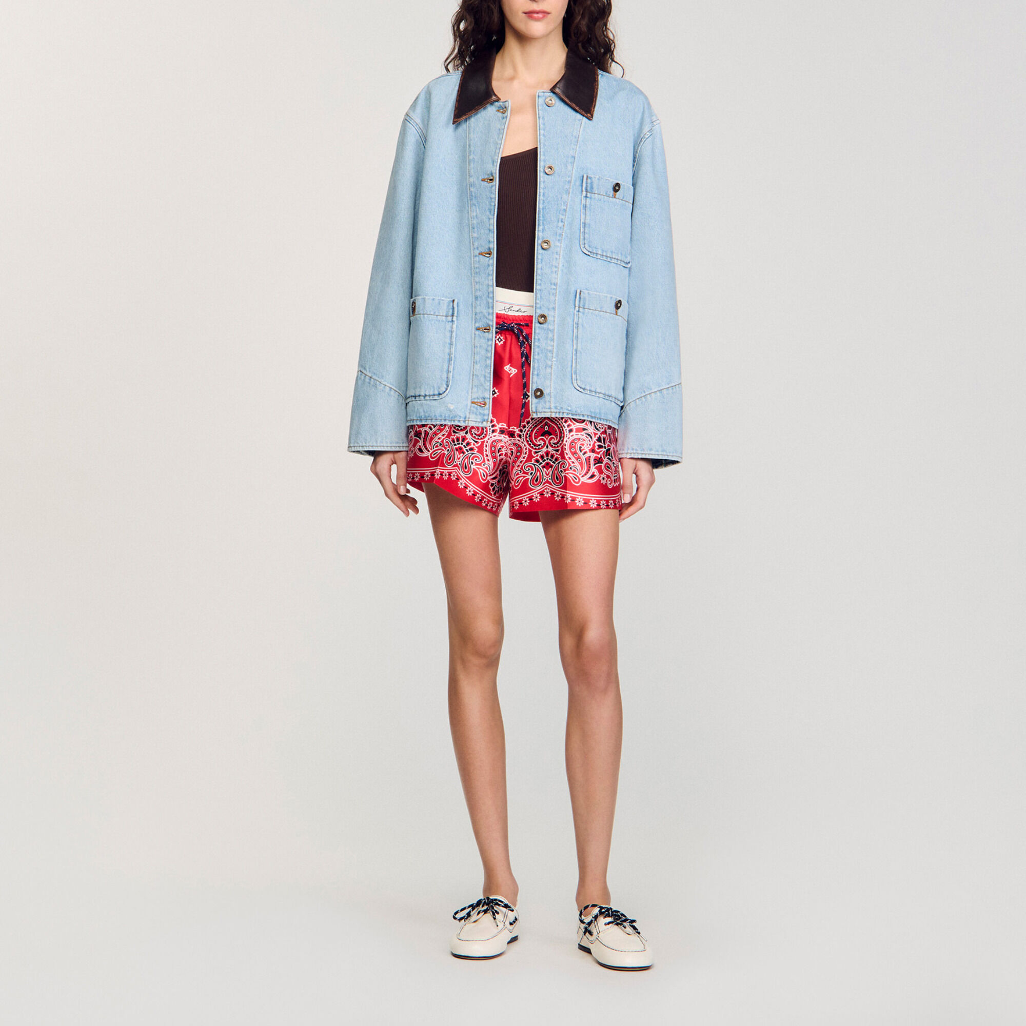 Denim jacket with leather collar