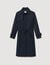 Trench coat with pleated inset