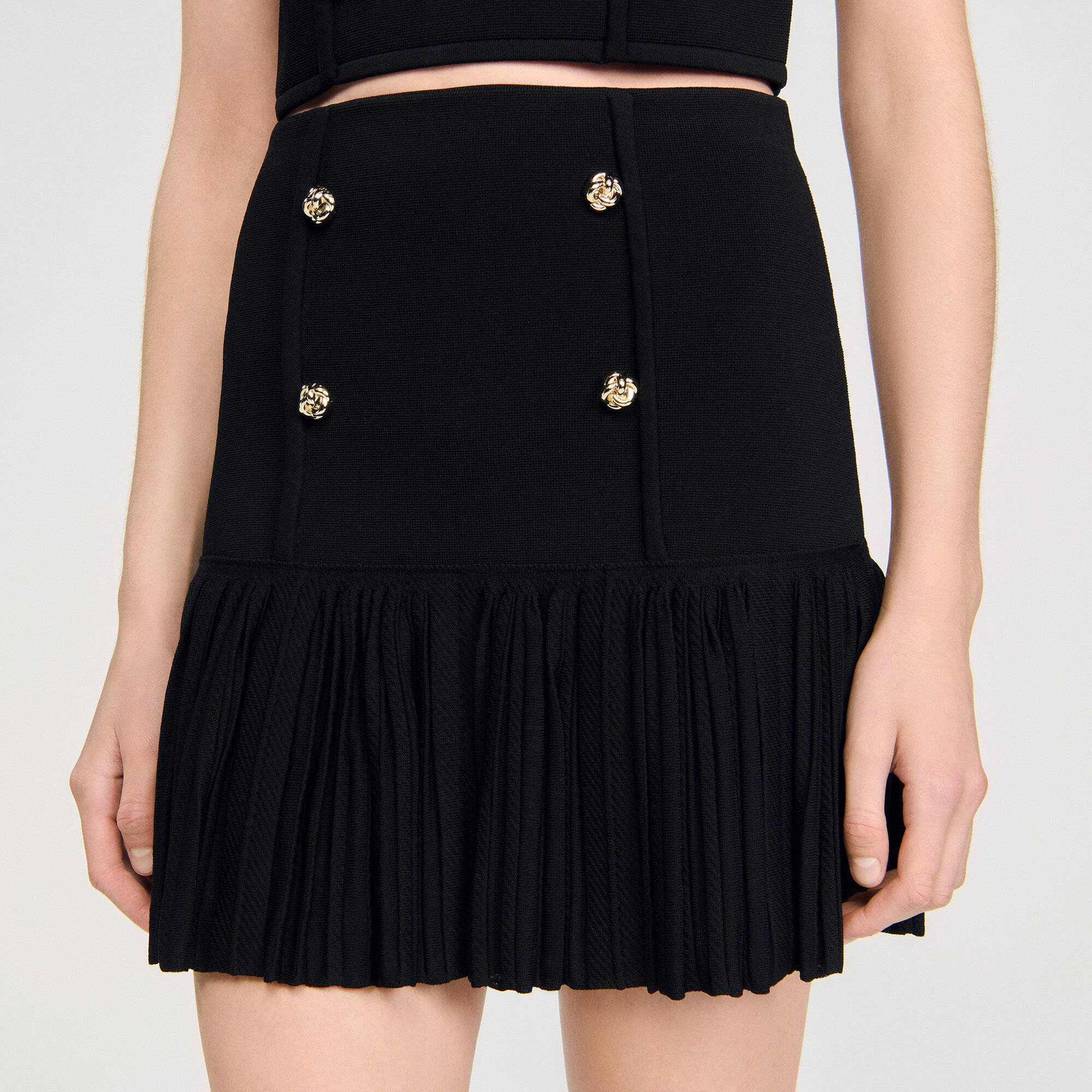 Mini pleated knit skirt