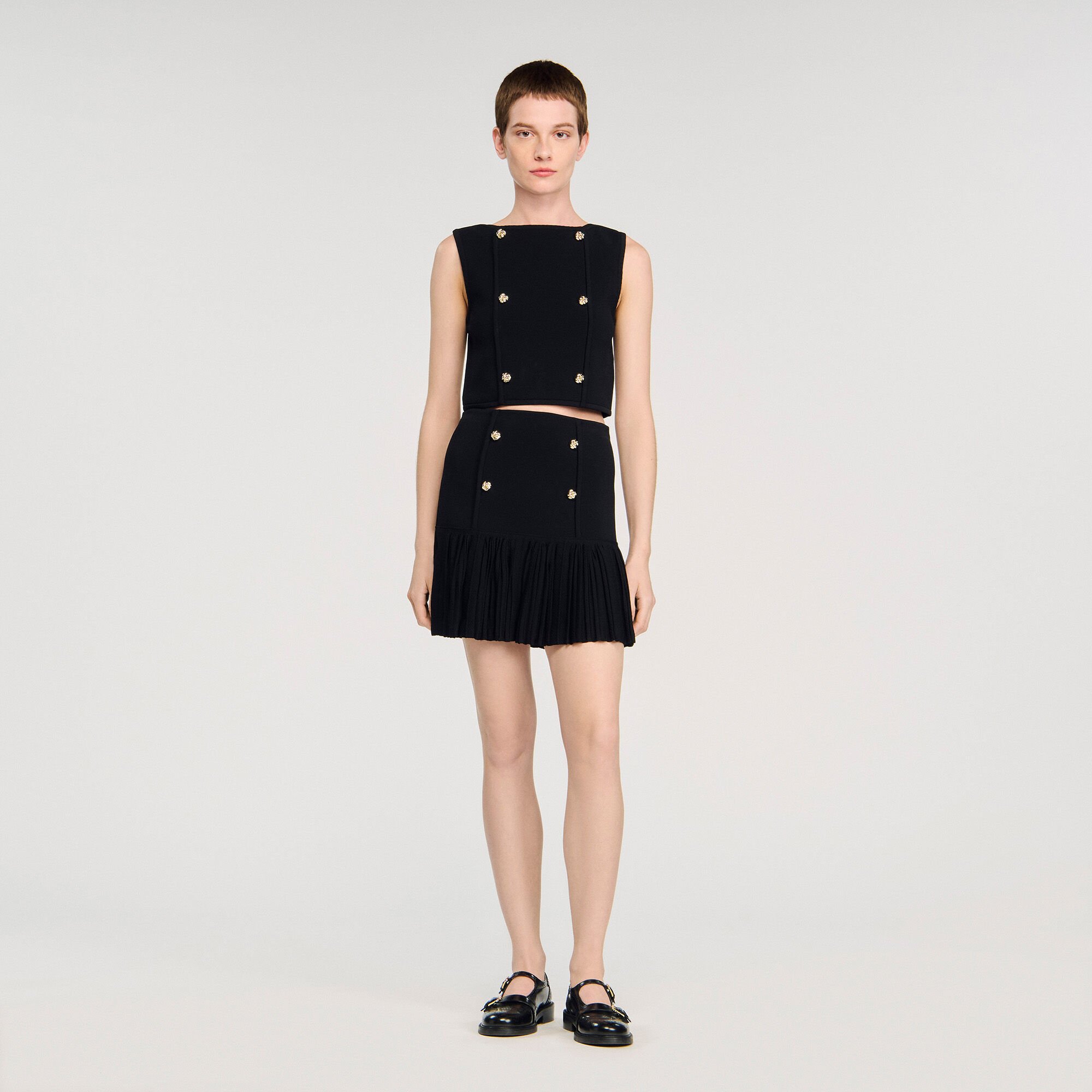 Mini pleated knit skirt