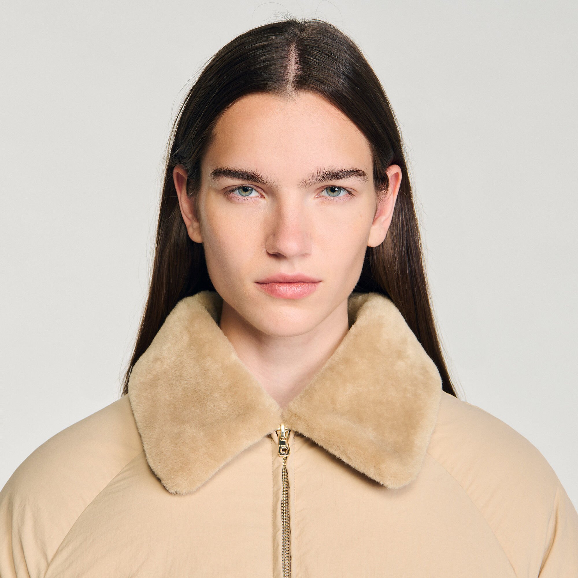 Puffer jacket with shearling collar