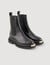 Ankle boots with notched sole