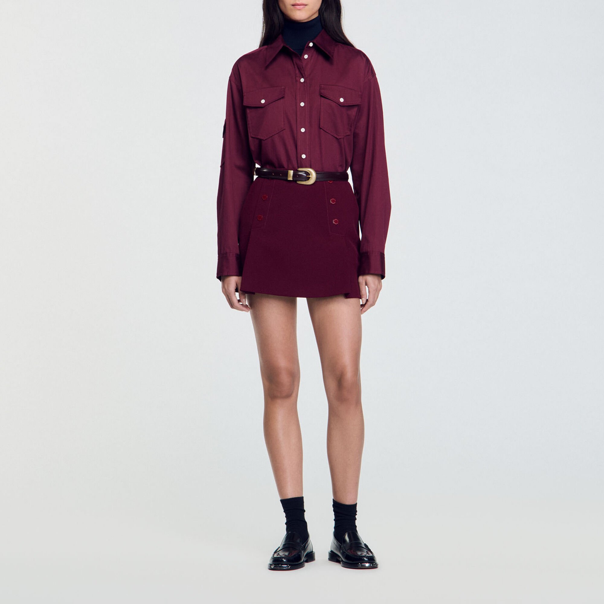 Short skirt with press studs