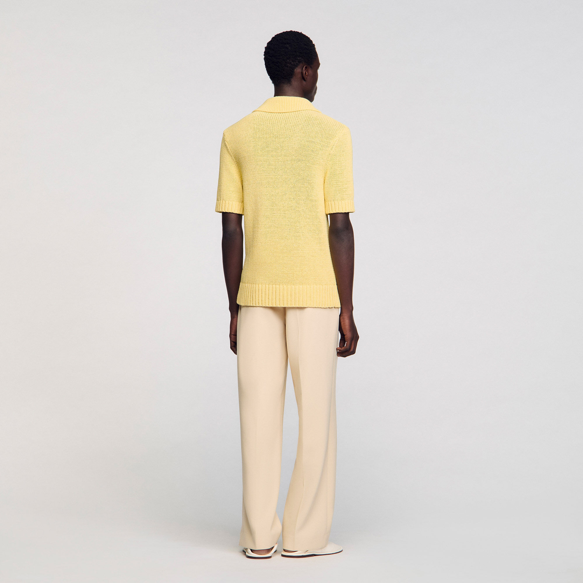 Knit polo shirt yellow / orange for Men | Sandro Paris