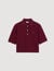 Polo shirt with decorative buttons