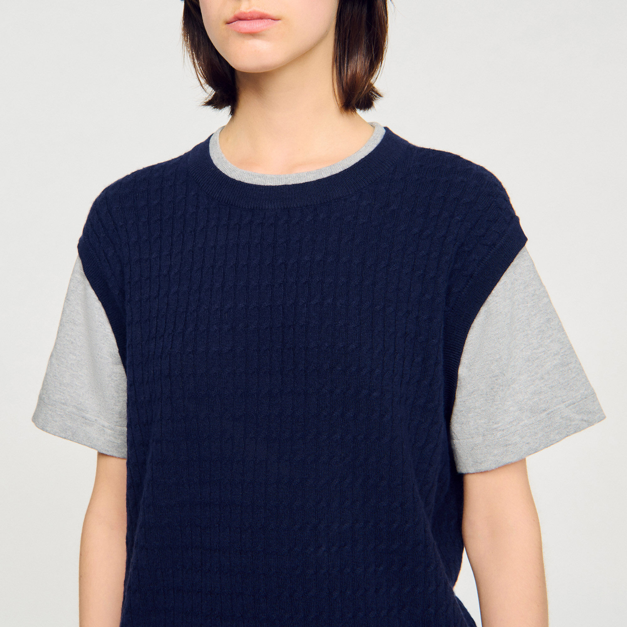 Dual-material knit sweater
