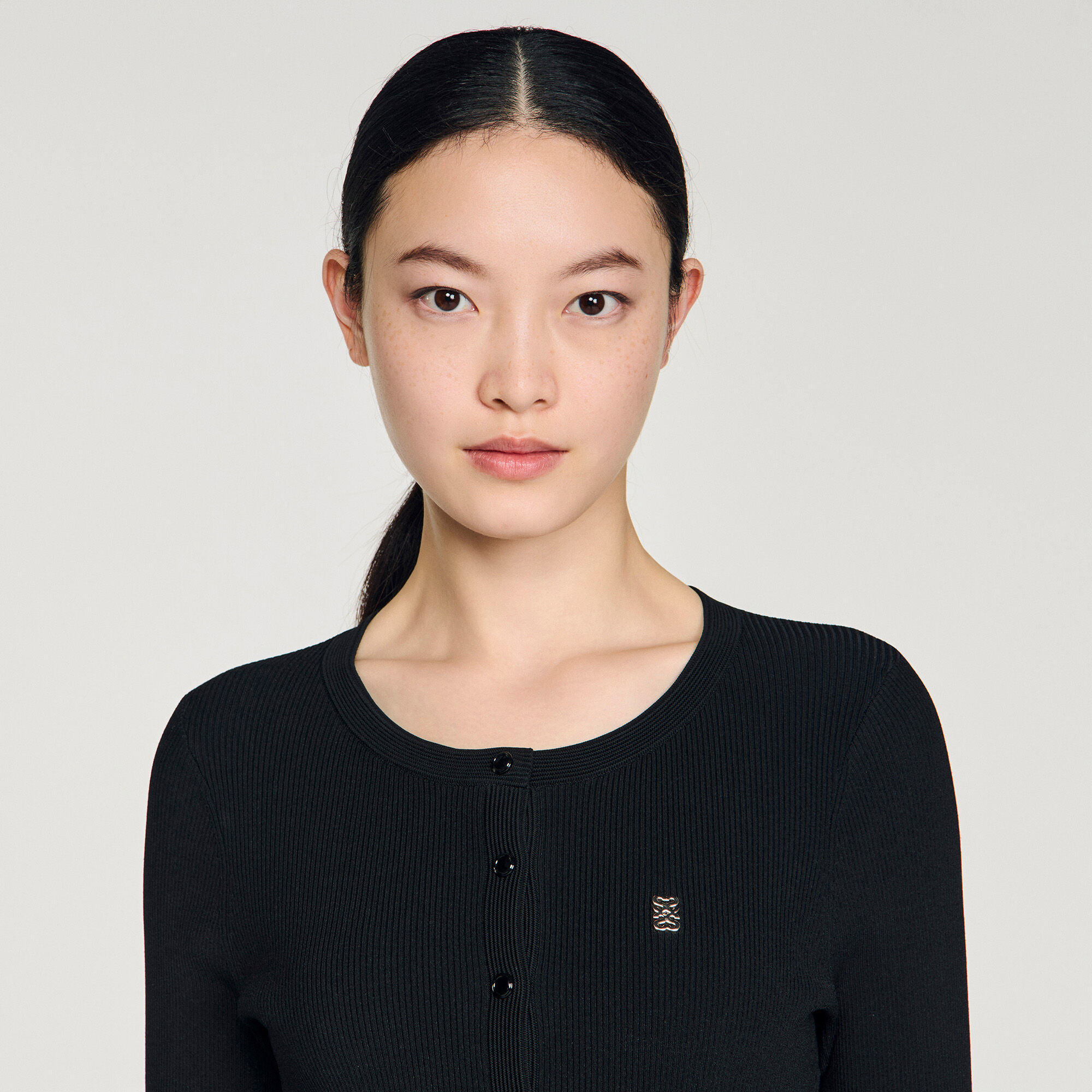 Pleated knit mini dress in Black for Women | Sandro Paris