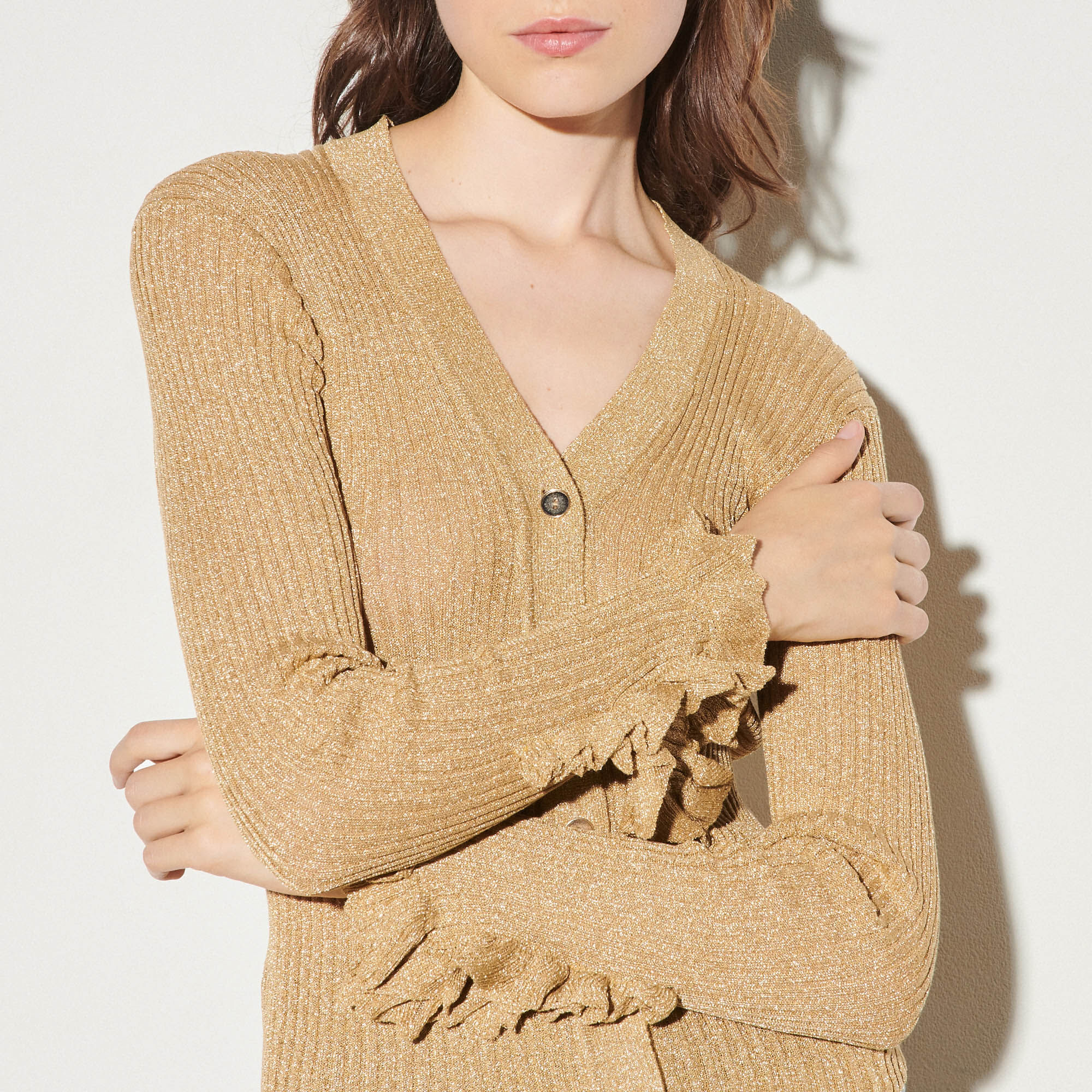 gold color cardigan